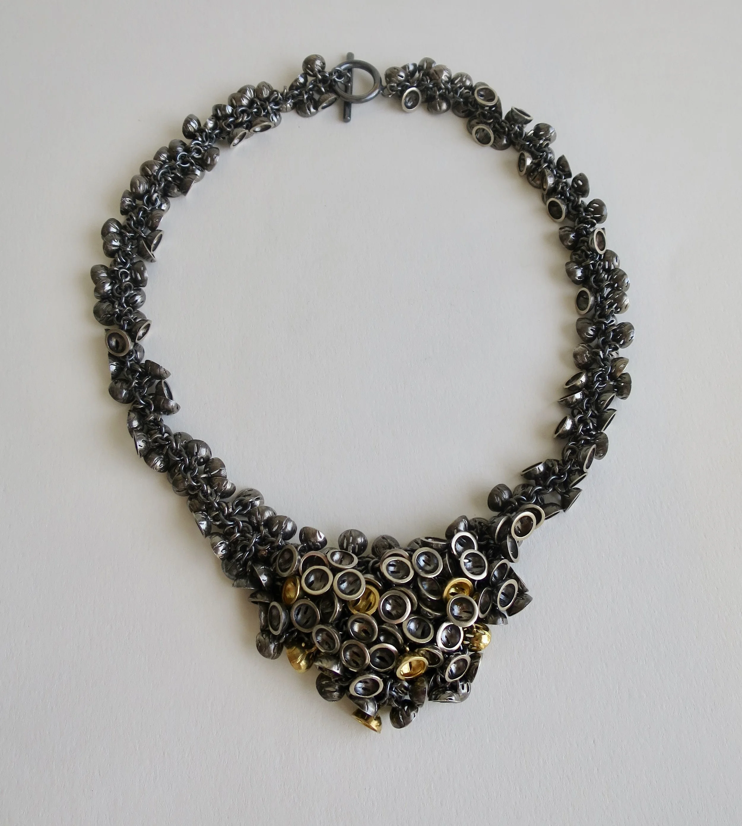 Oxidized sterling silver with 22kt gold neckpiece