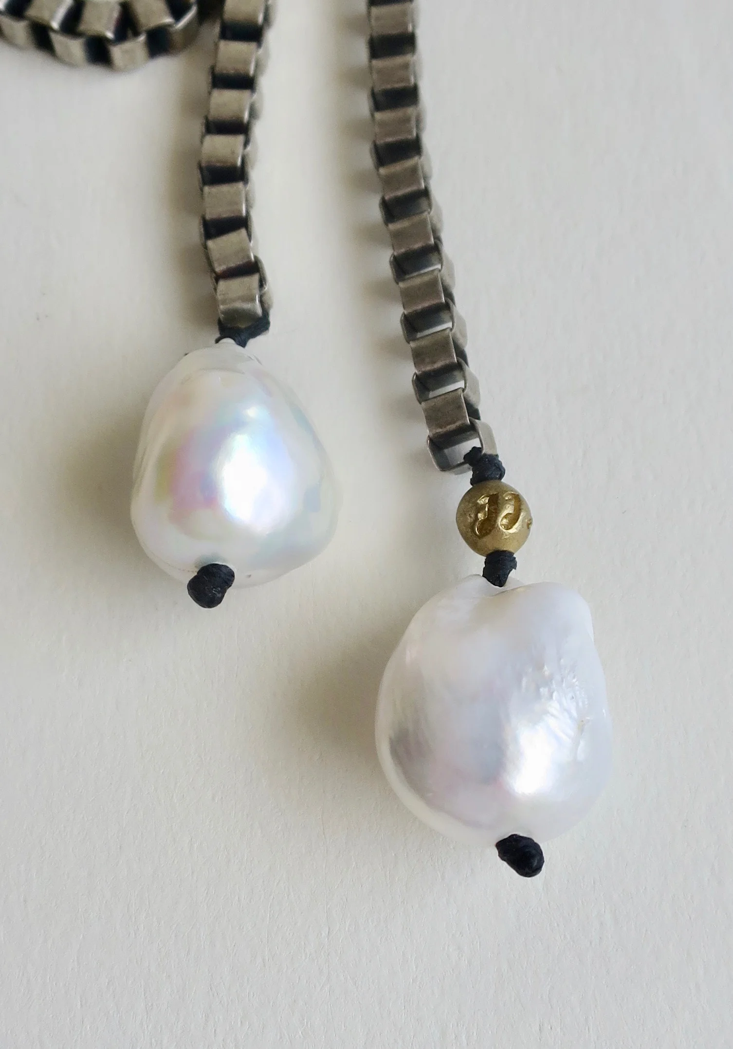 Metal links with large Pearls