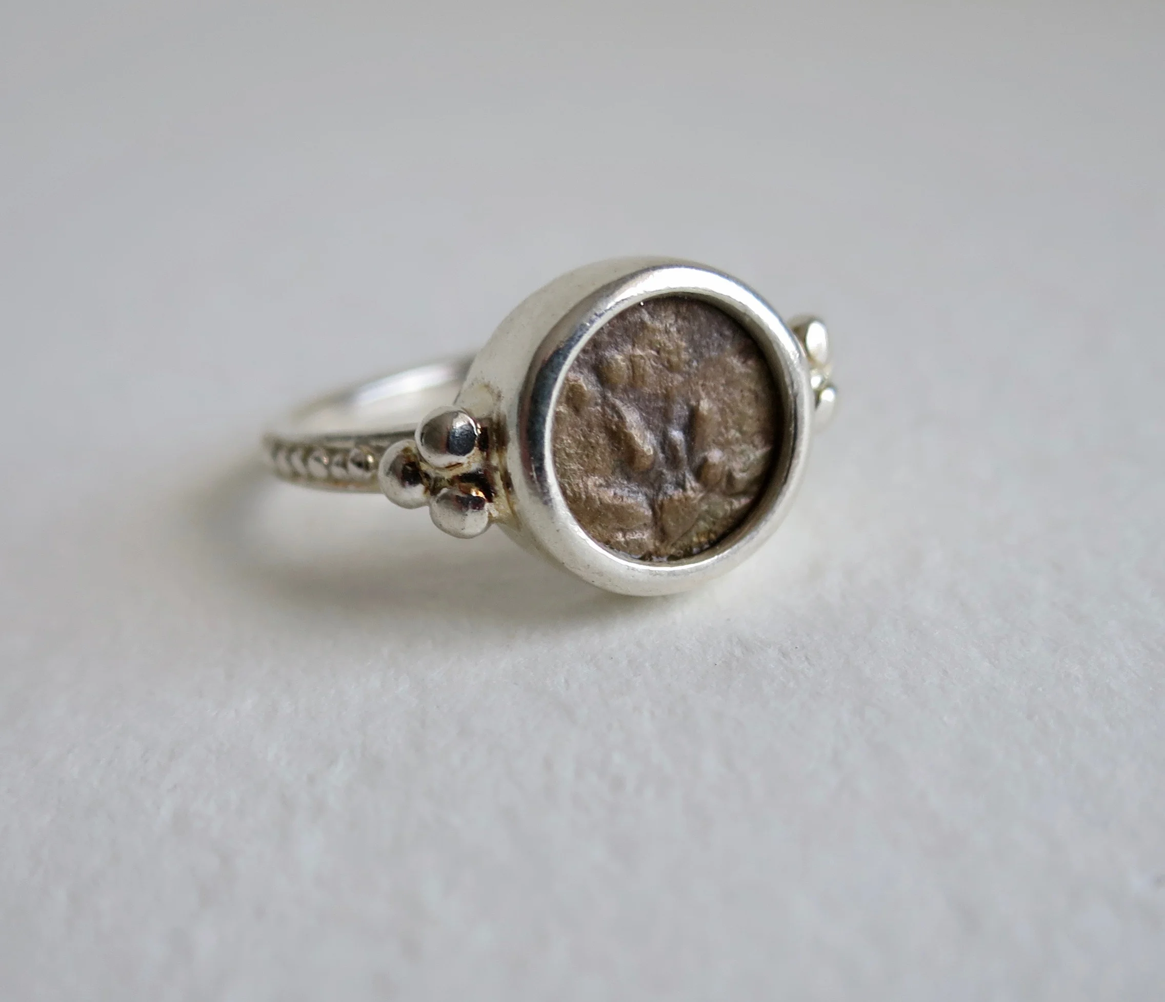 Widow's mite coin set in silver ring