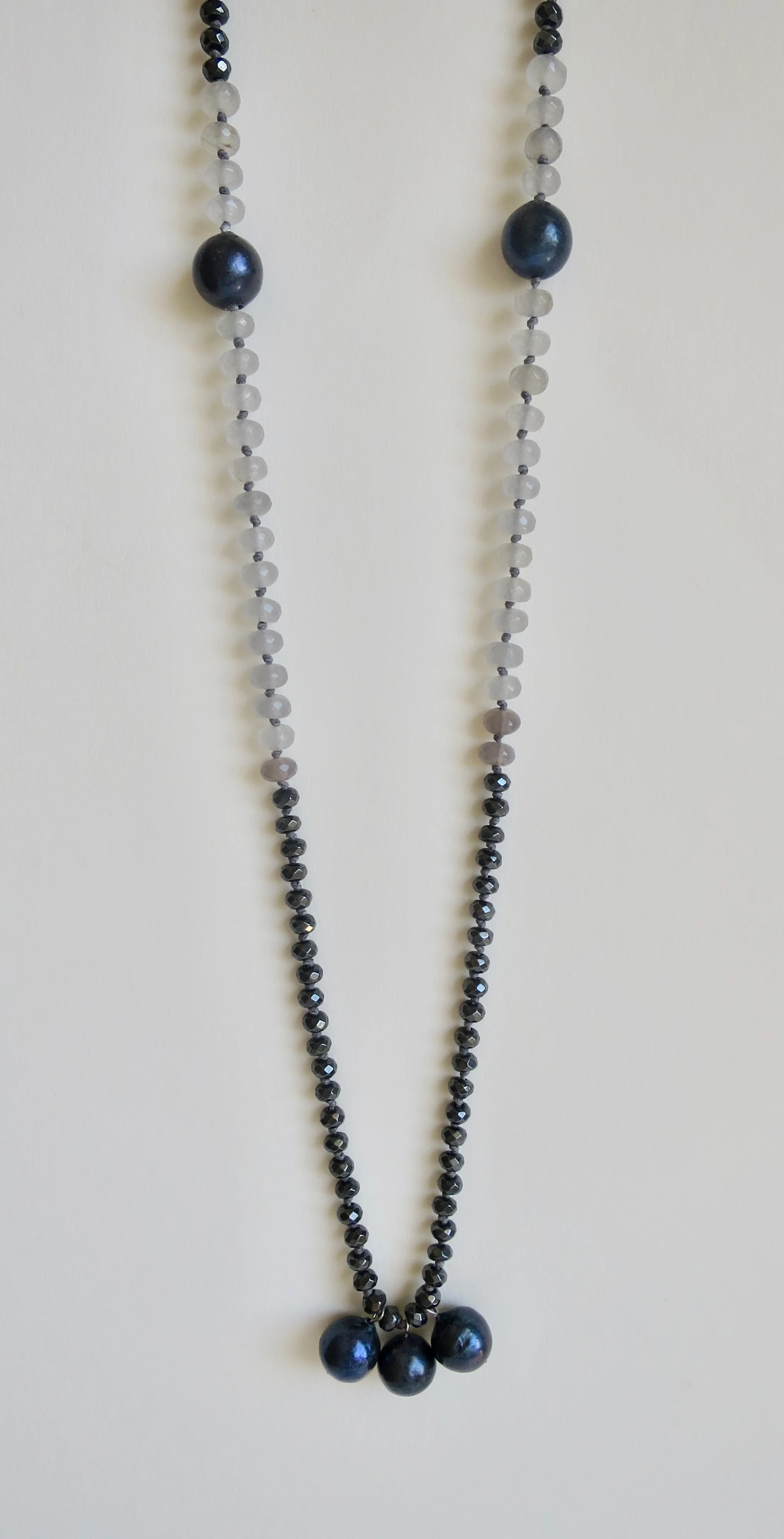Hematite and off-white agate necklace with purple pearls