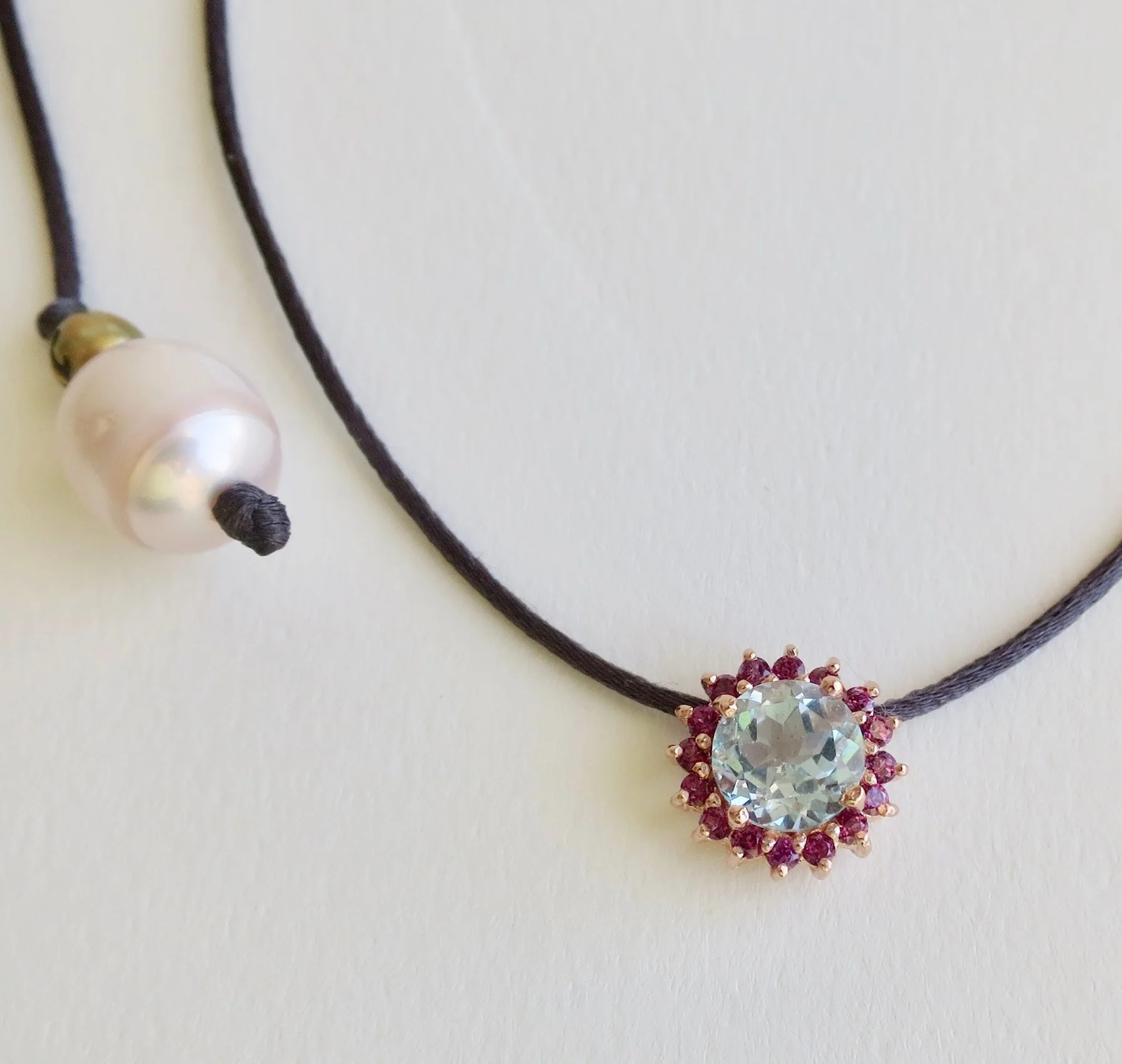 Jewelry Jewellery Choker with Blue Topaz and Pink Sapphires on satin with Pearl backdrop