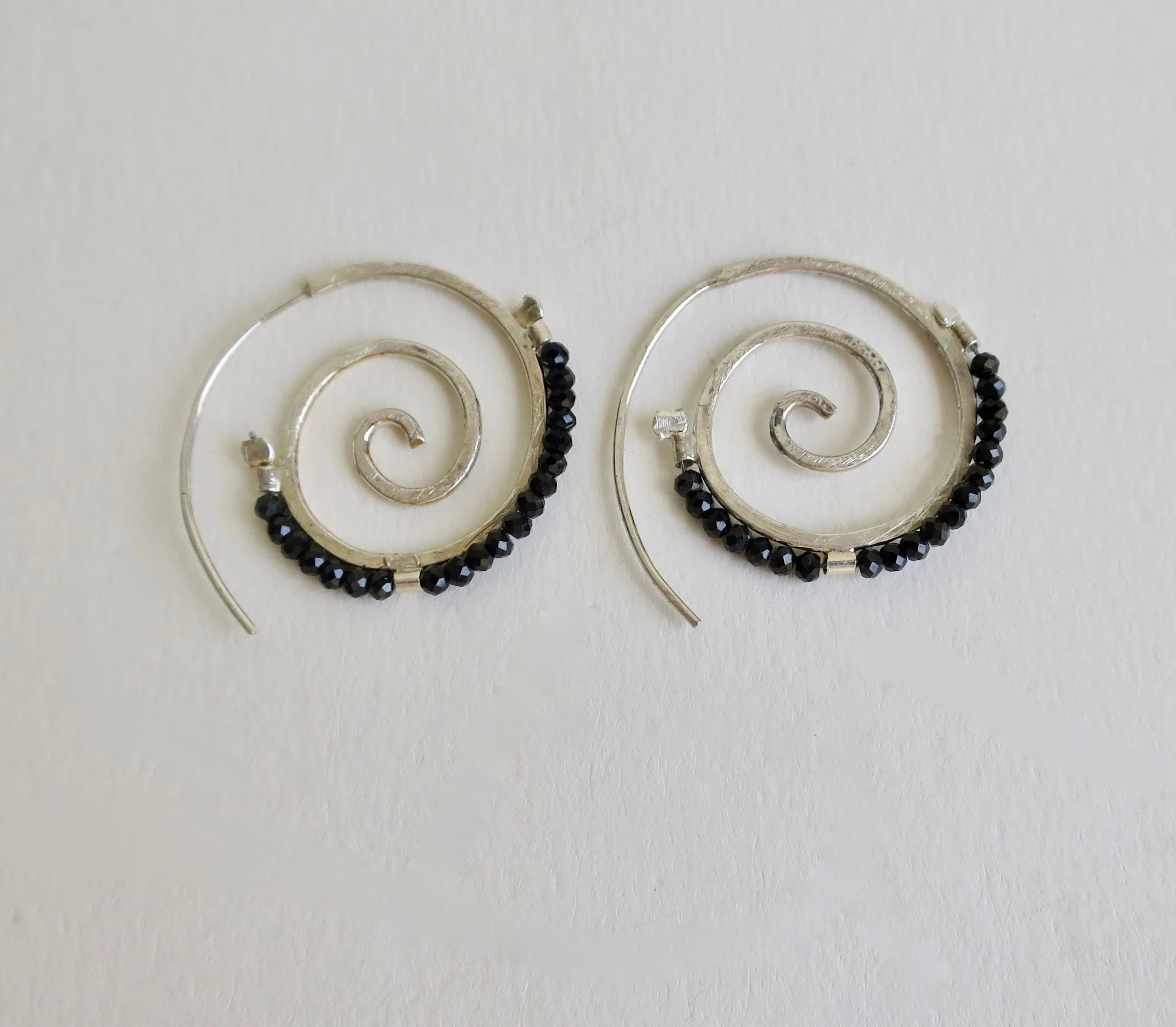 Black Spinel spiral earrings in silver