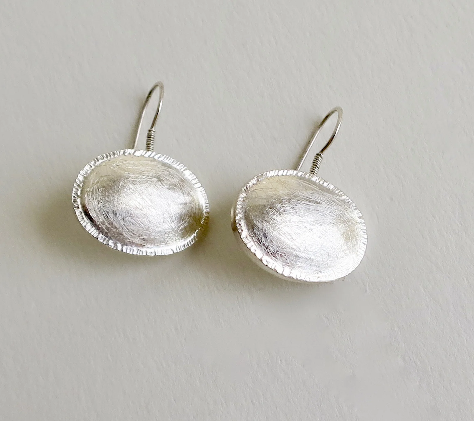 Handmade silver oval earrings