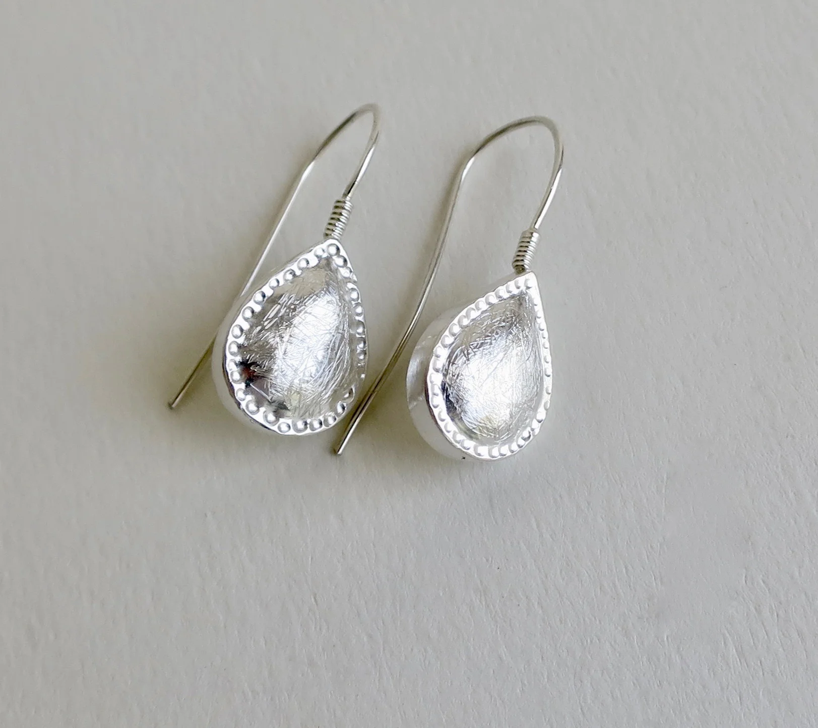 Silver 'teardrop design' earrings
