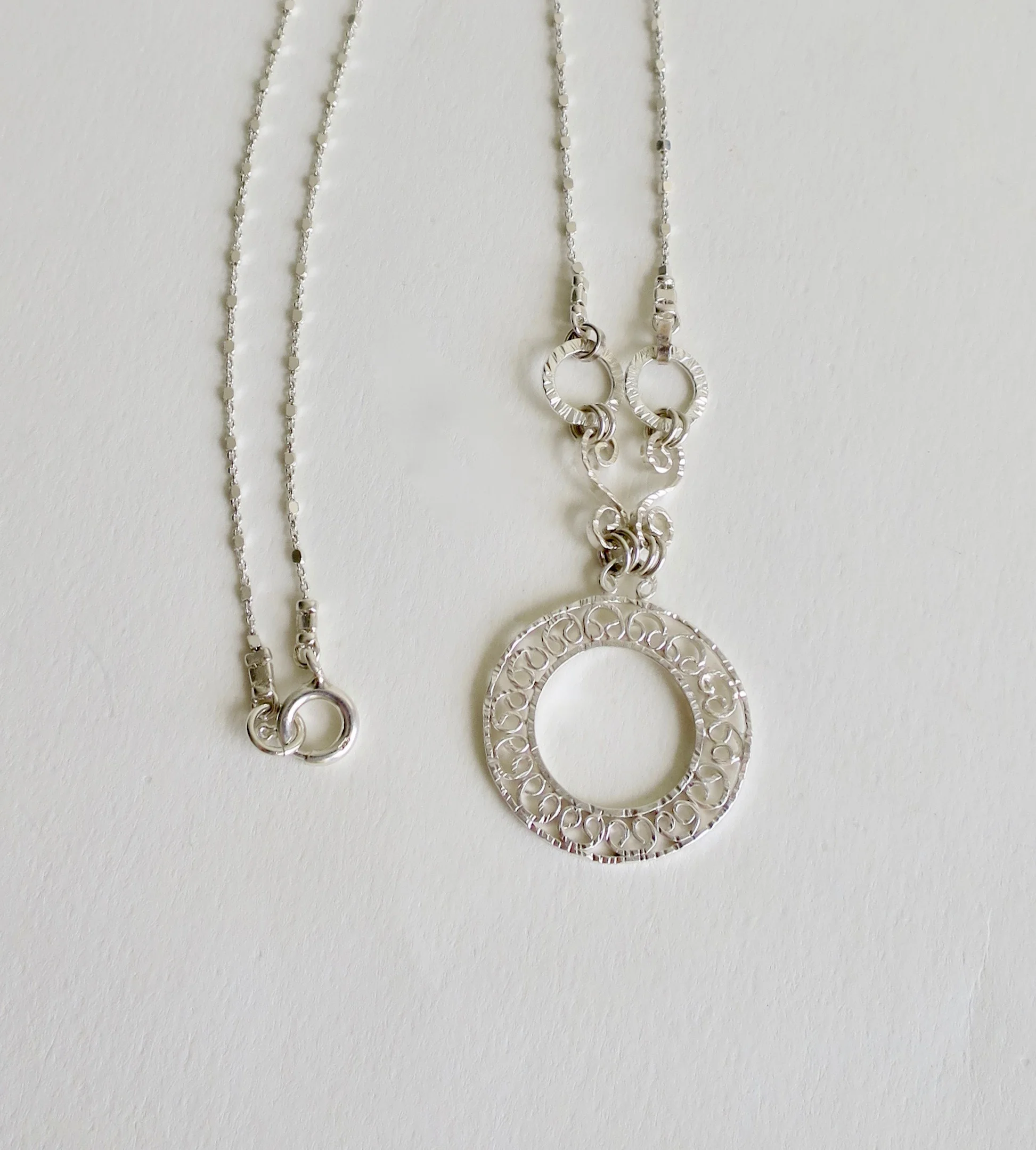 Silver pendant with 'snow' design