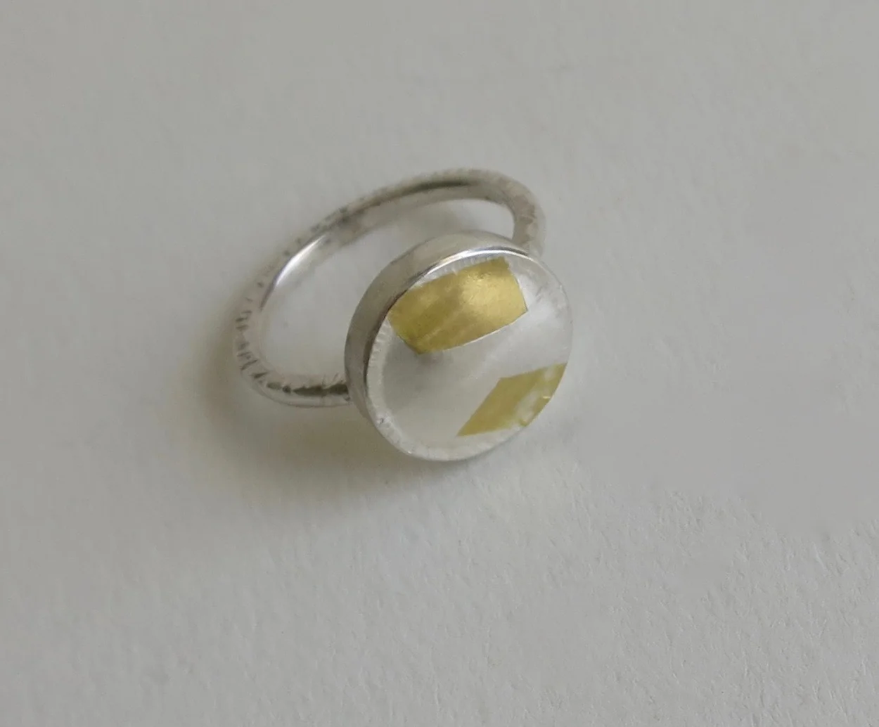 Handmade fine silver ring with 22kt gold