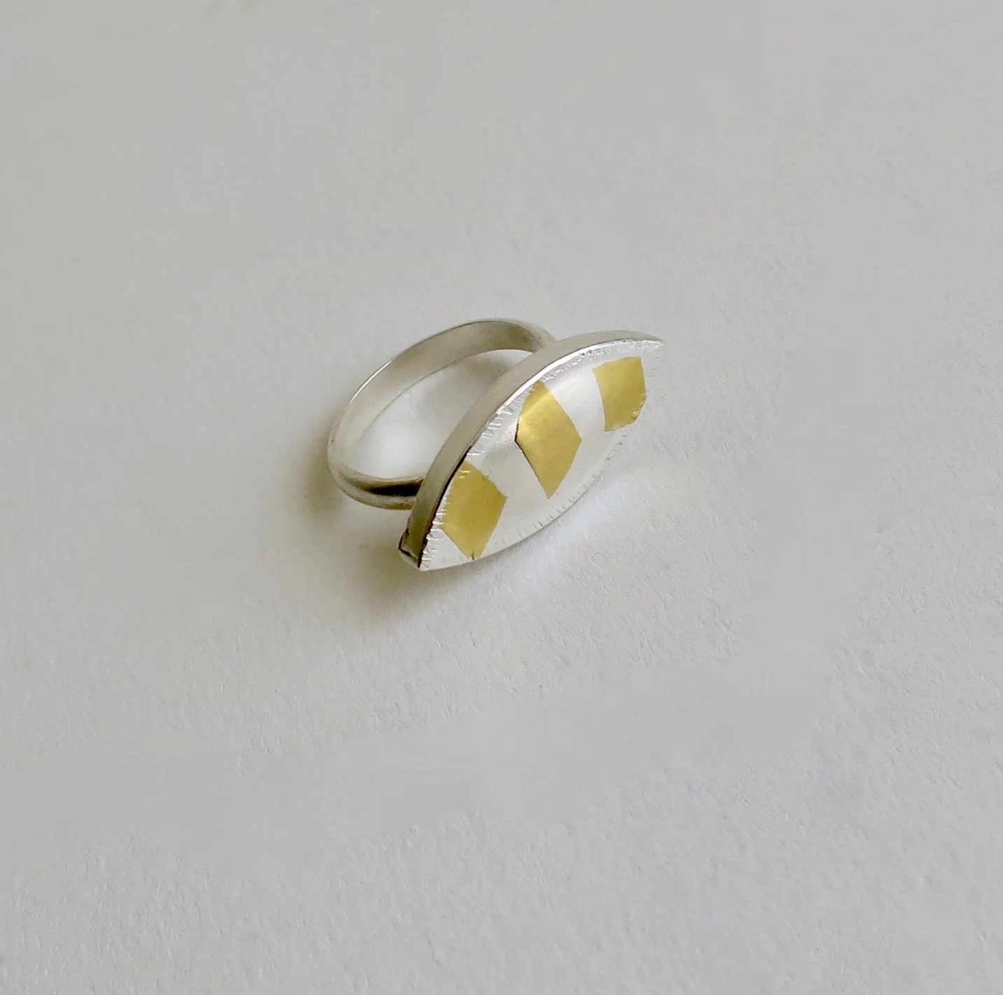 Fine Silver ring with 22kt Gold.