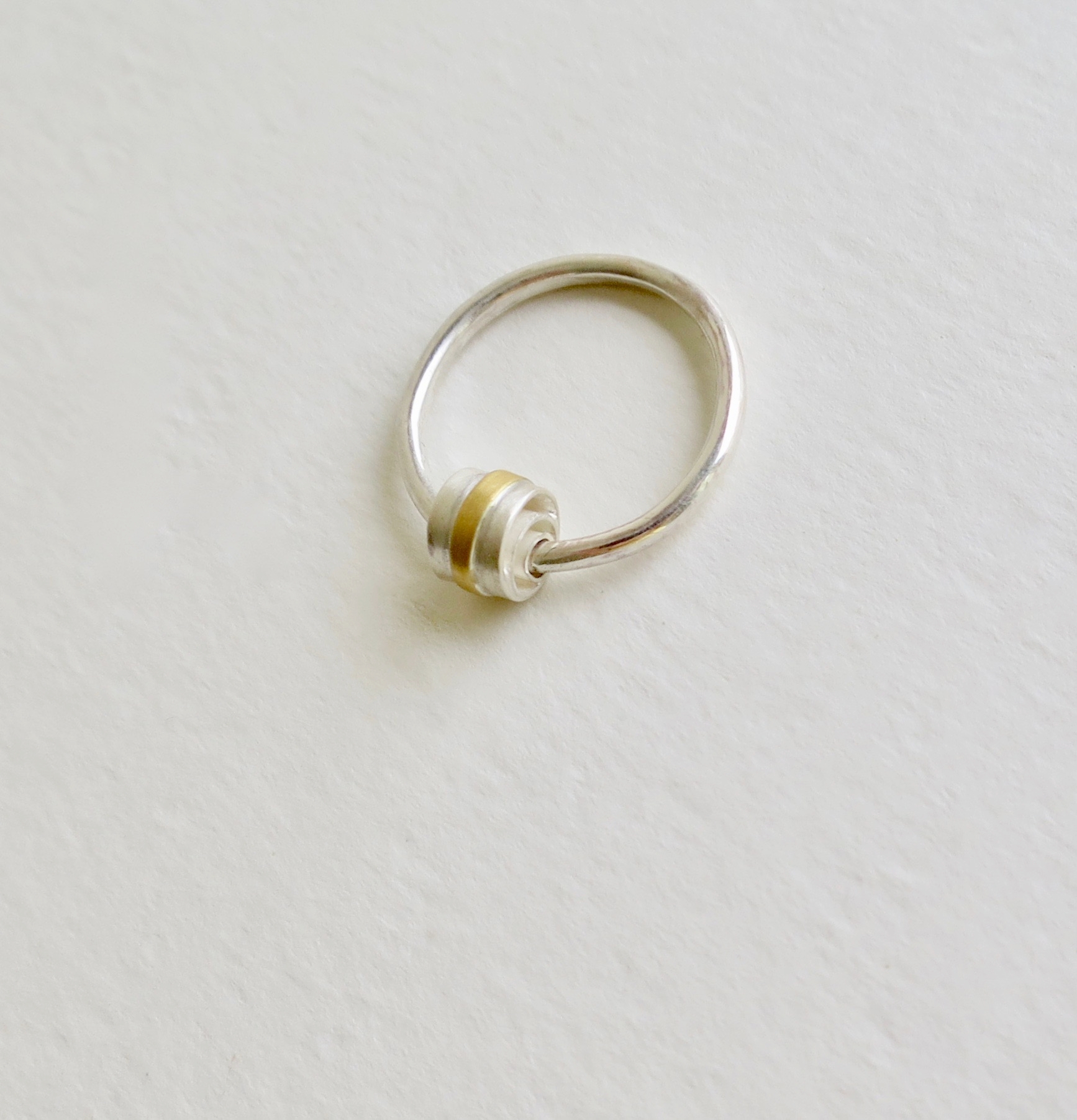 Silver ring with moveable silver element with 22kt Gold Jewelry Jewellery