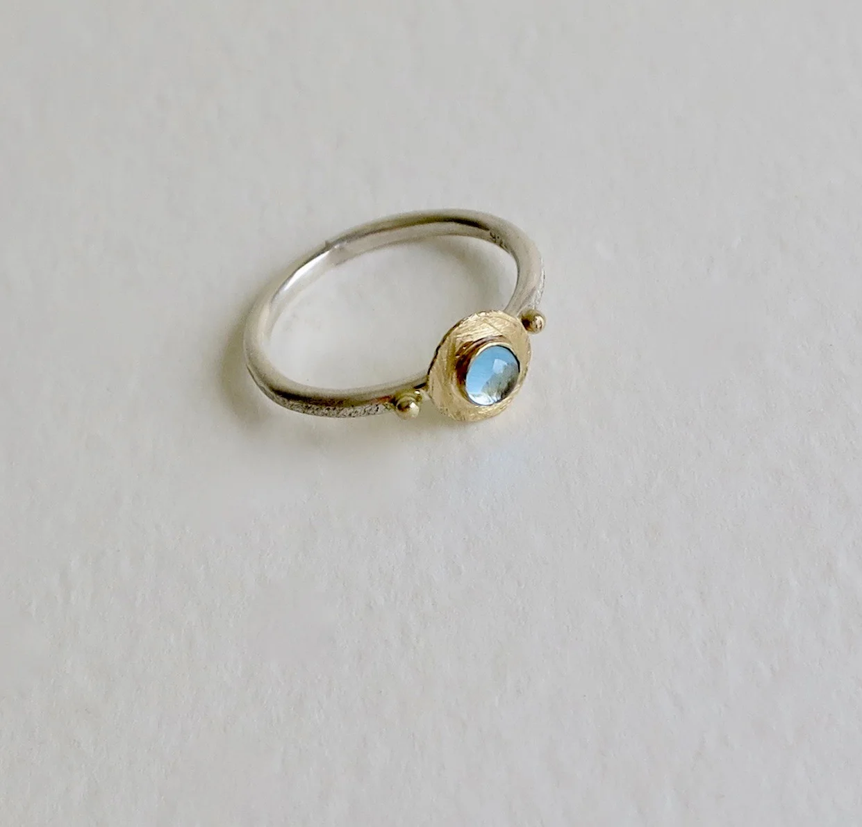 Blue Topaz ring with silver and 18kt Gold