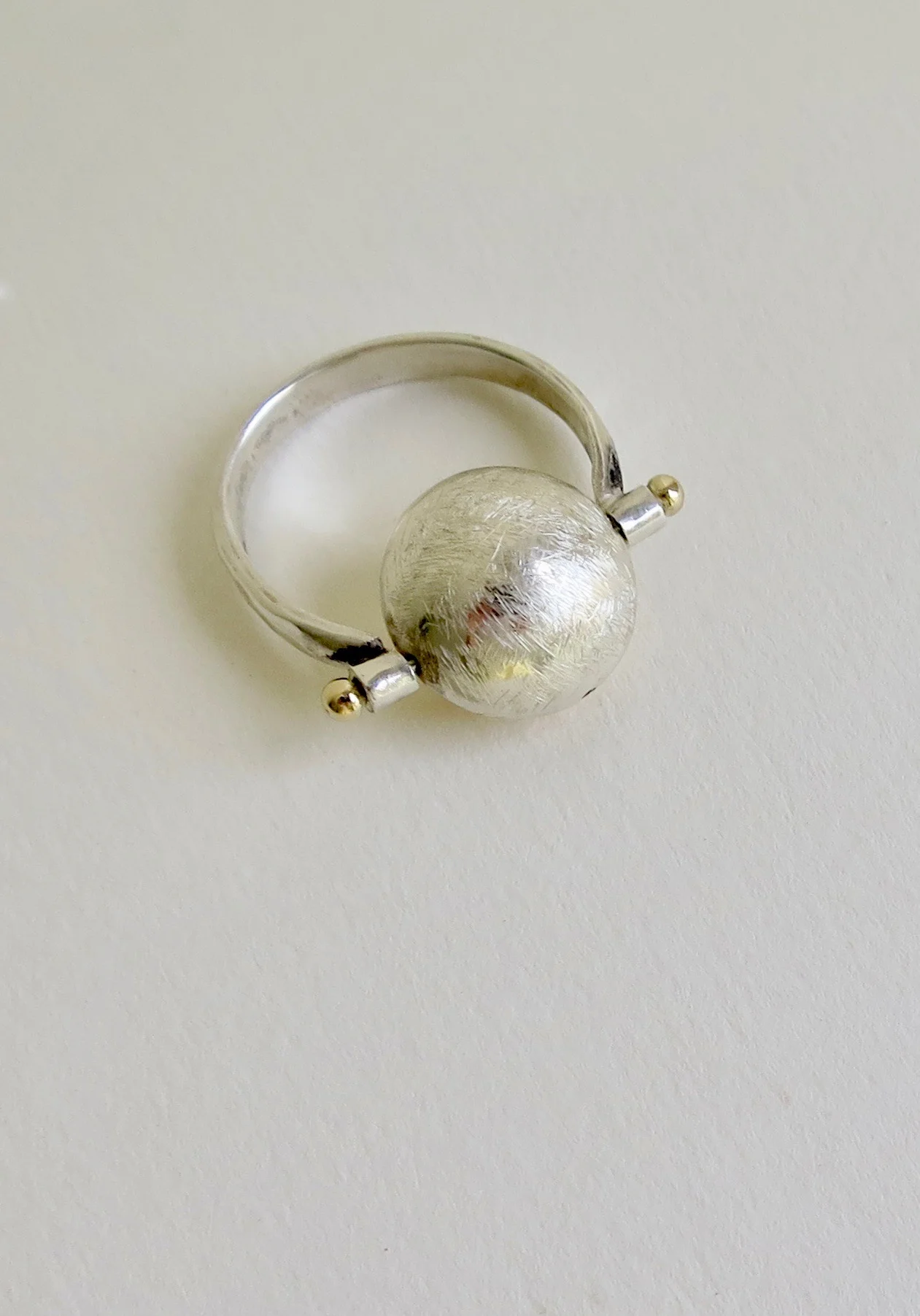 Fine silver and 18kt Gold swivel ring