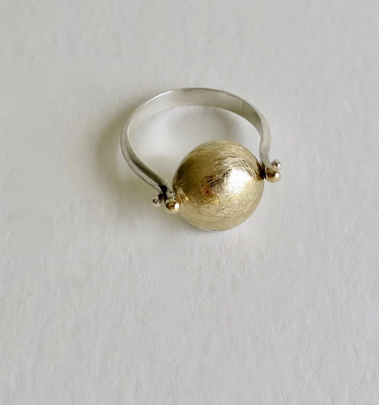Handmade swivel silver and gold ring 