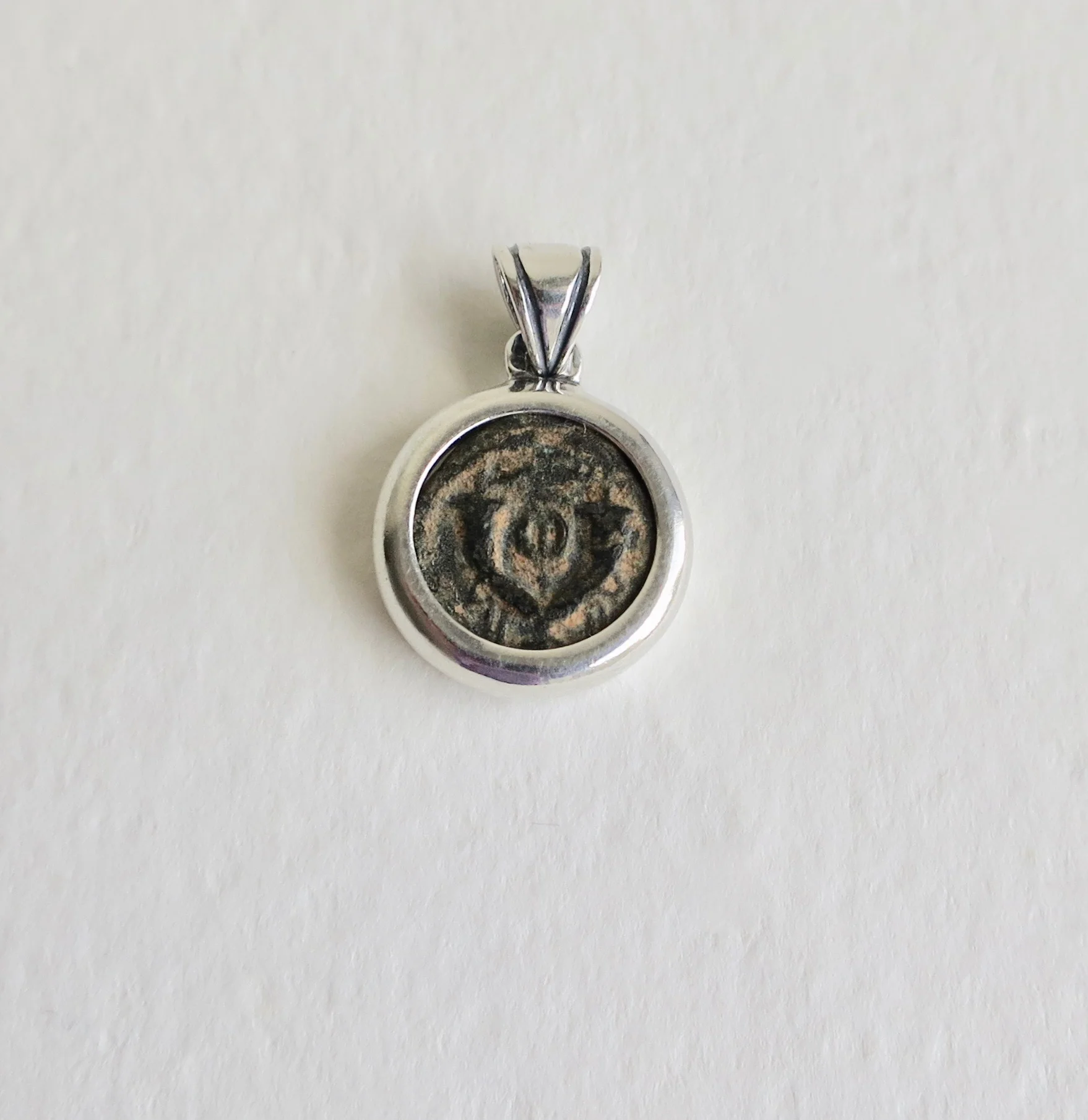 Widow's mite bronze coin in silver pendant
