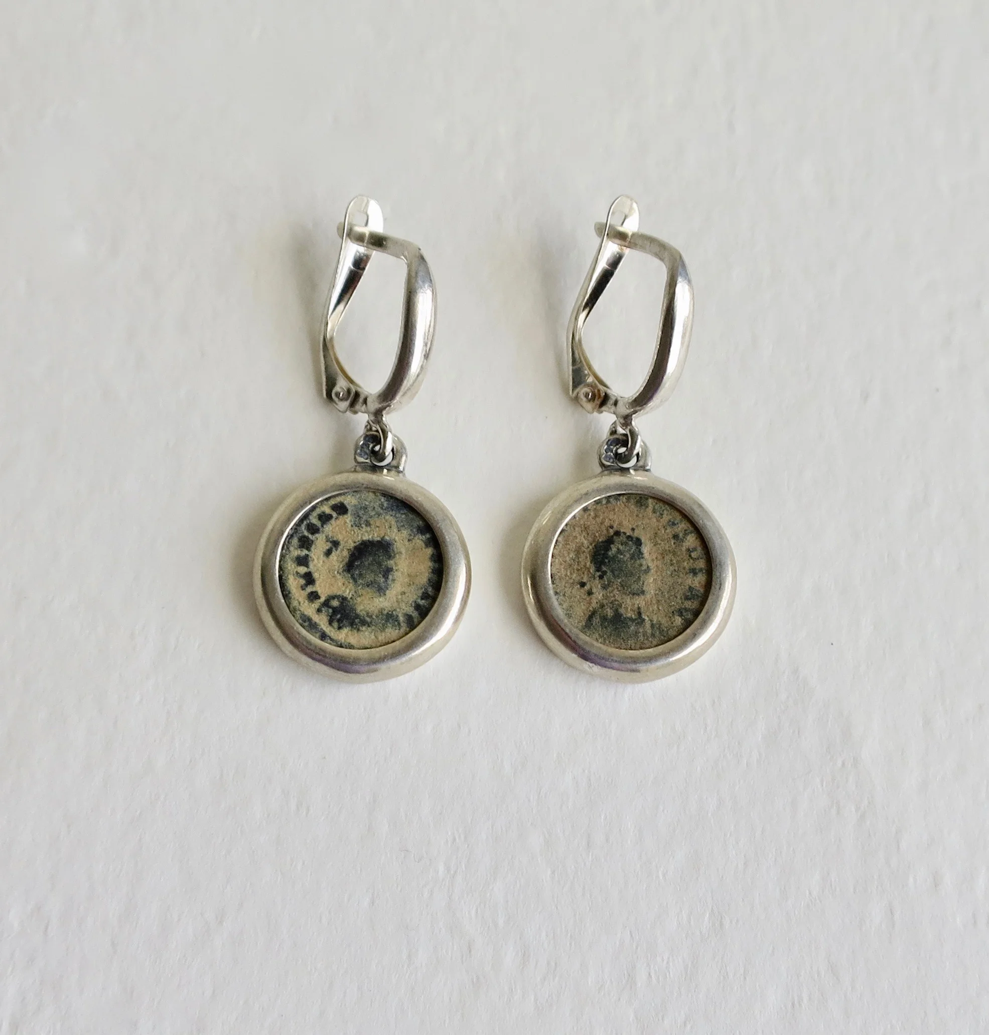 Bronze coin earrings, depicting Theodosius, set in silver 