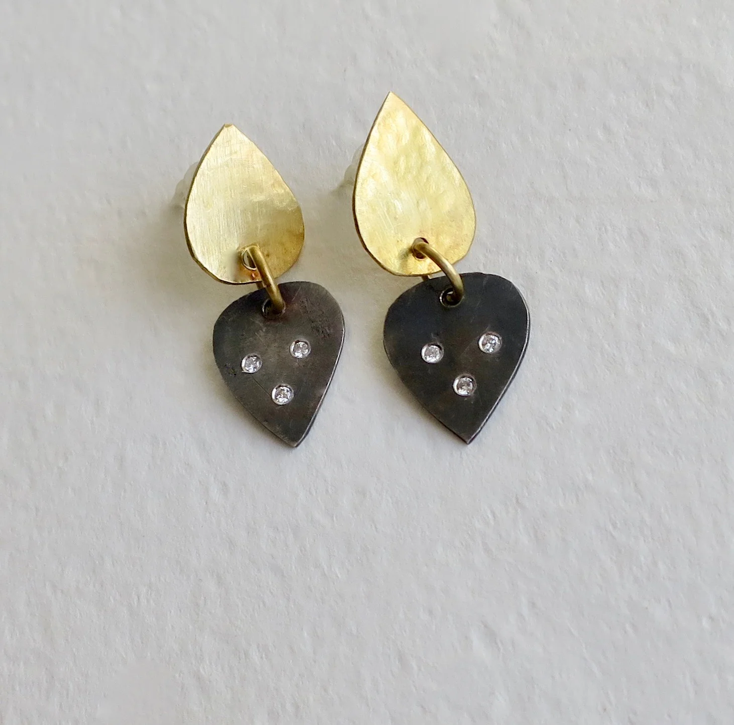 Silver and Gold Lotus earrings with diamonds