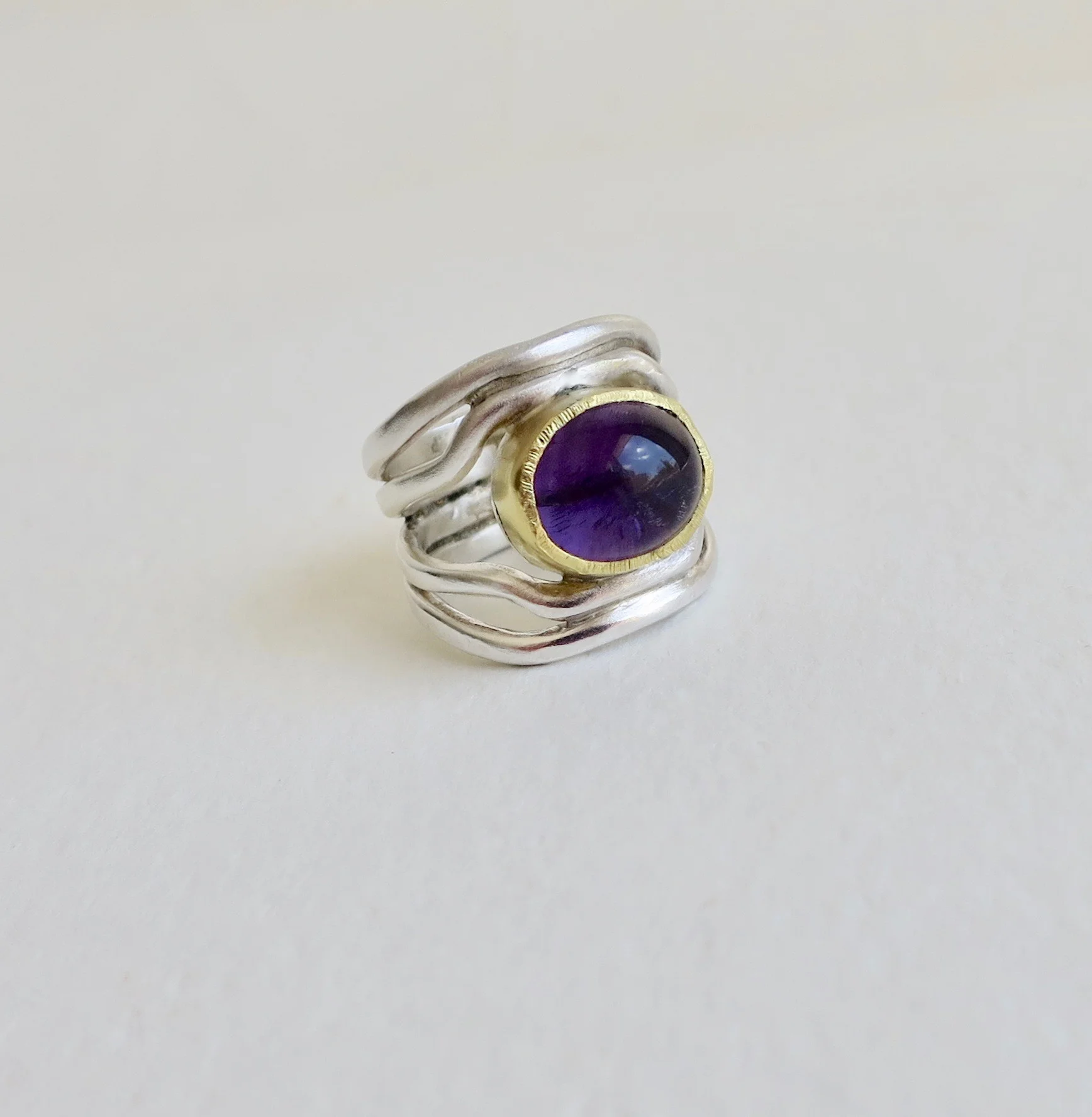 Amethyst silver ring with 22kt gold