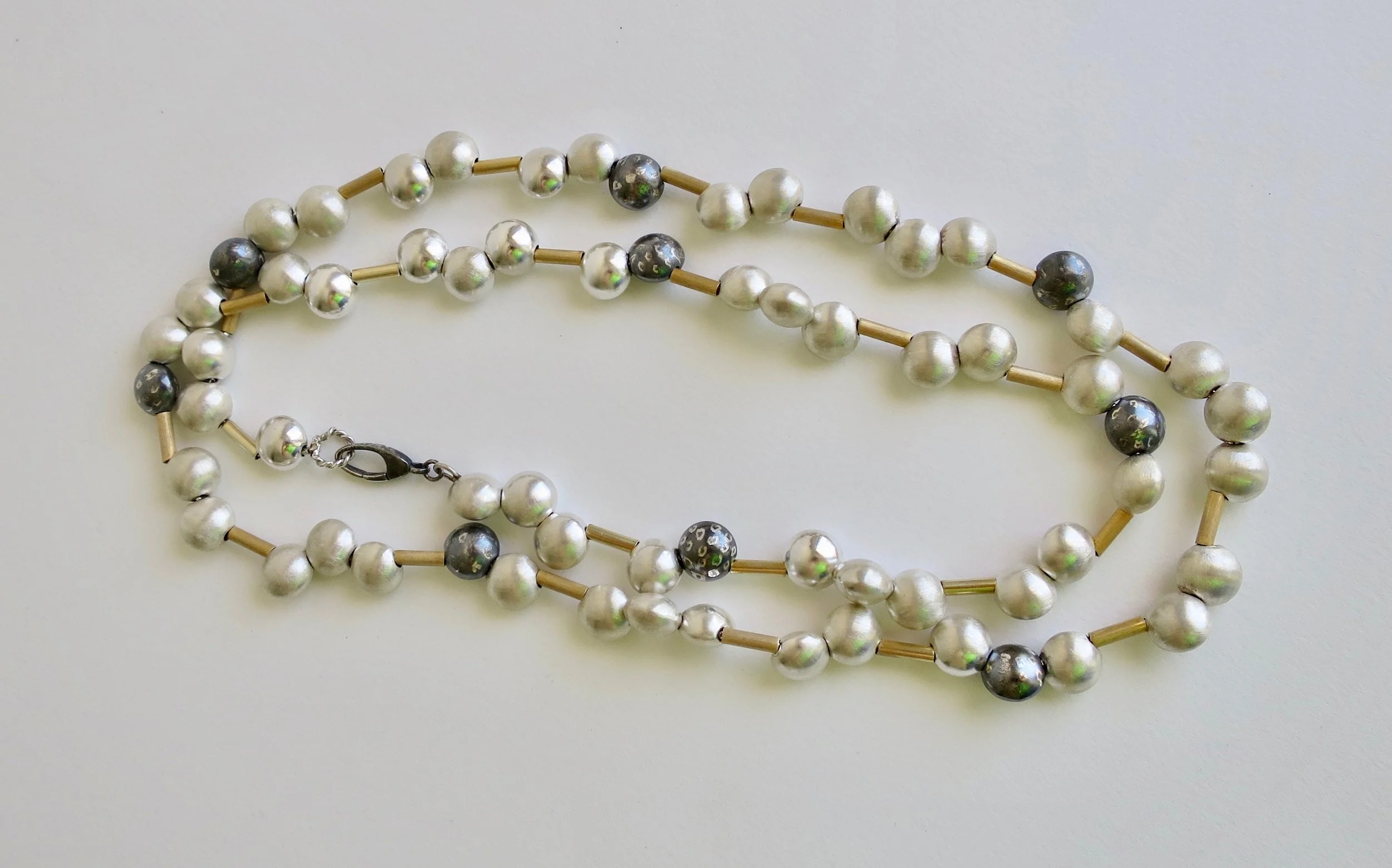 Unique, handmade long silver necklace with Vermeil