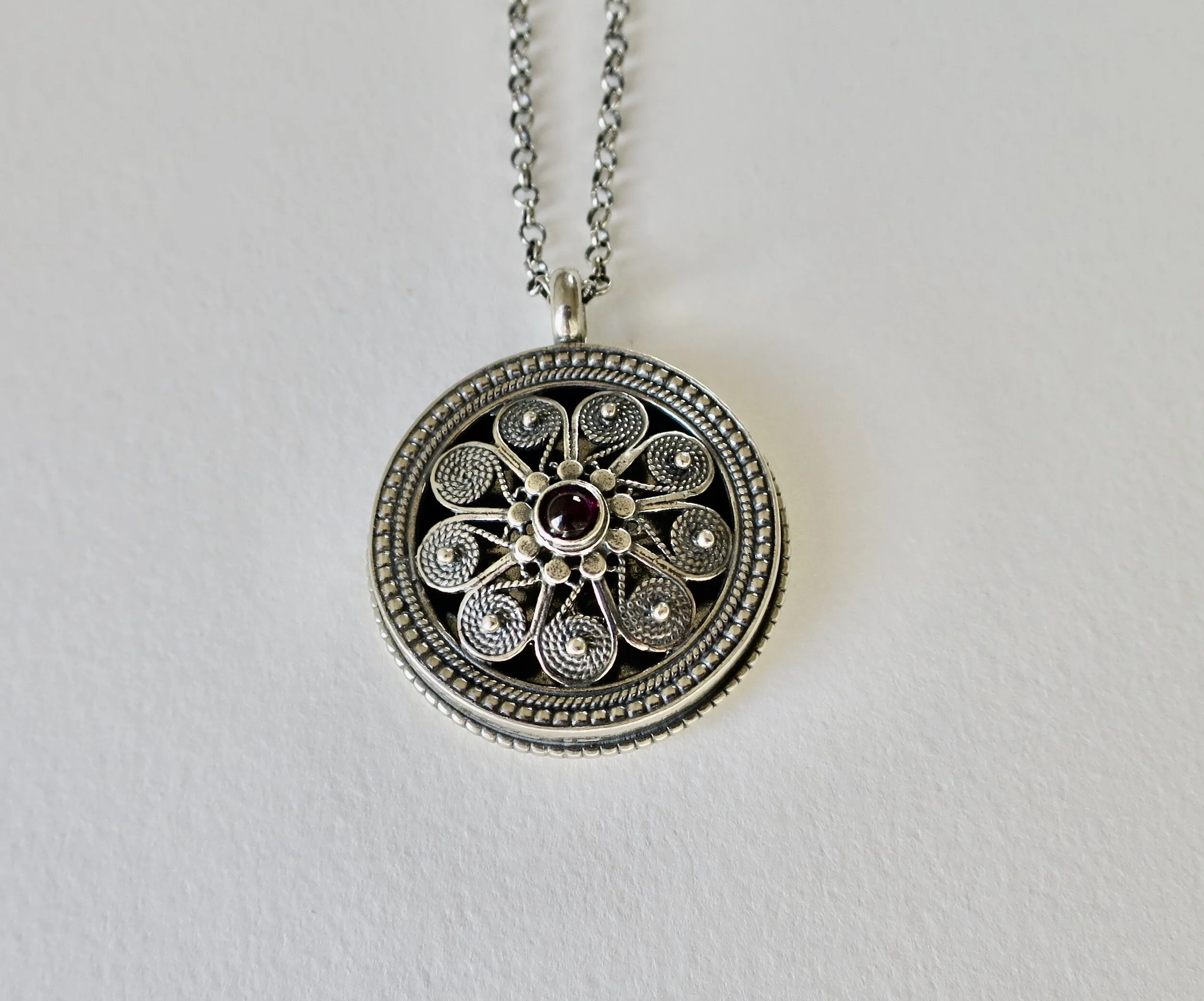 Sterling silver filigree handmade Amulet with Garnet 