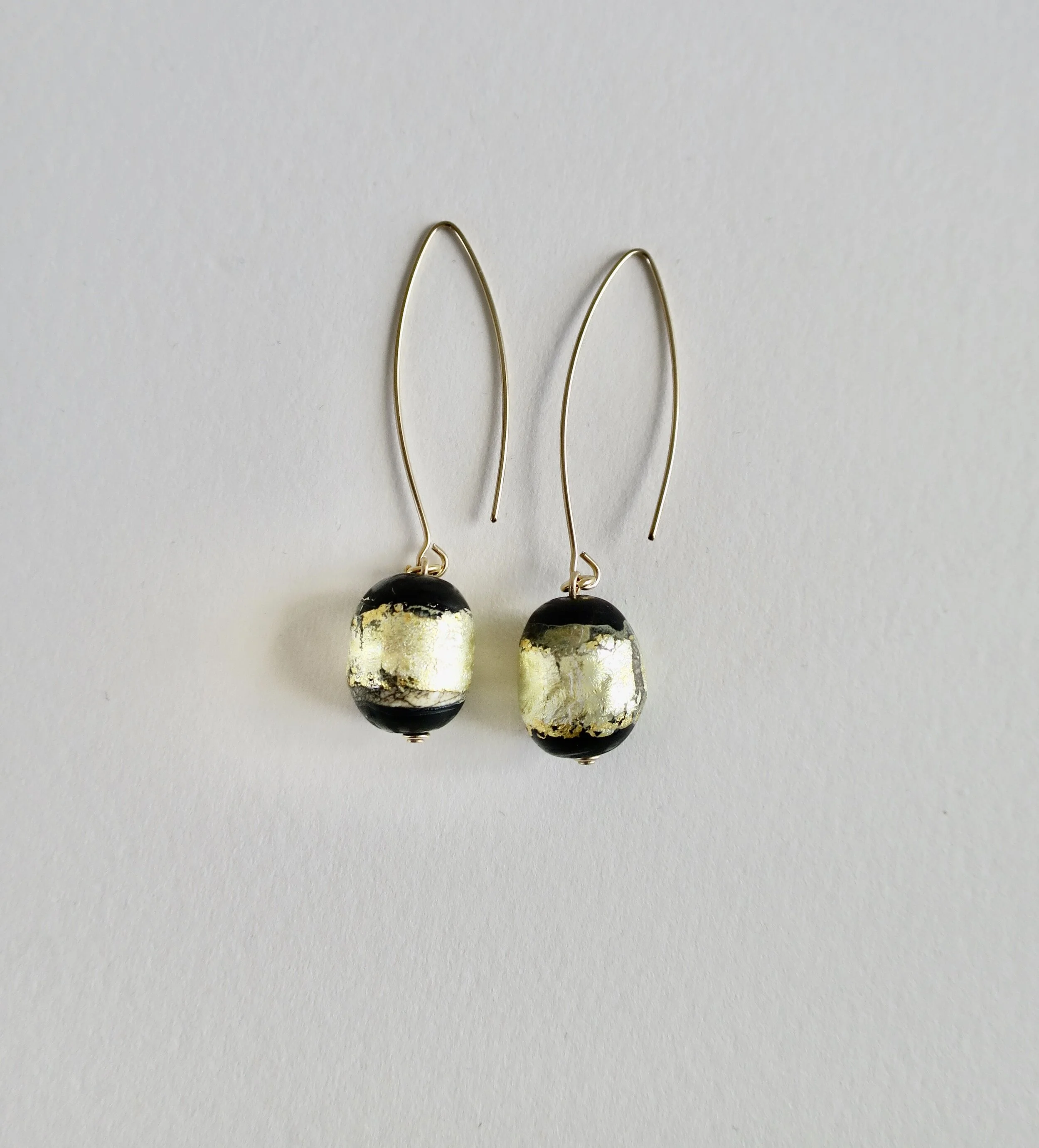 Blown glass black earrings with 22kt gold leaf