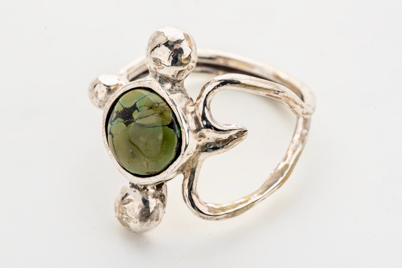 Green Turquoise set in heart shaped silver band