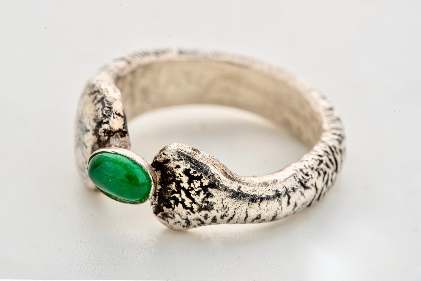 Jade set in handcrafted silver ring