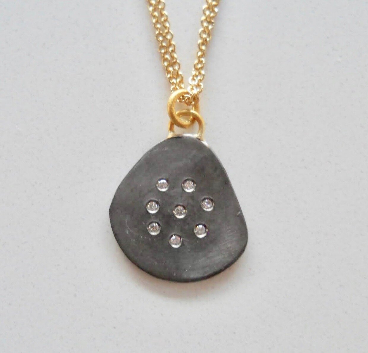 Oxidised fine silver pendant with diamonds