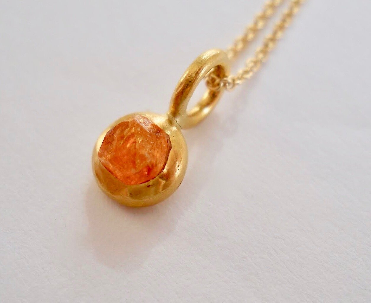 Mandarin Garnet set in 22kt gold pendant
