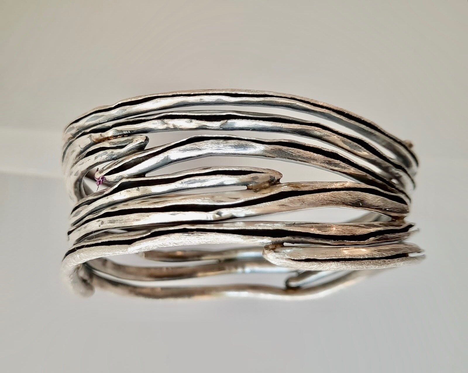 Pure silver cuff with oxidised and brush finish