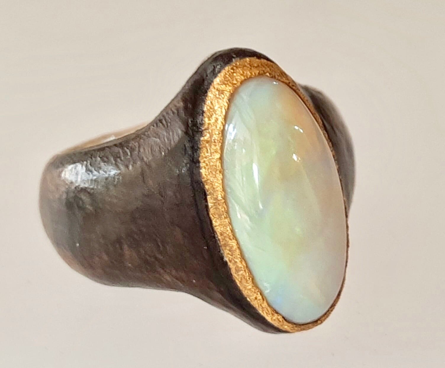 Opal set in Ebony and silver ring