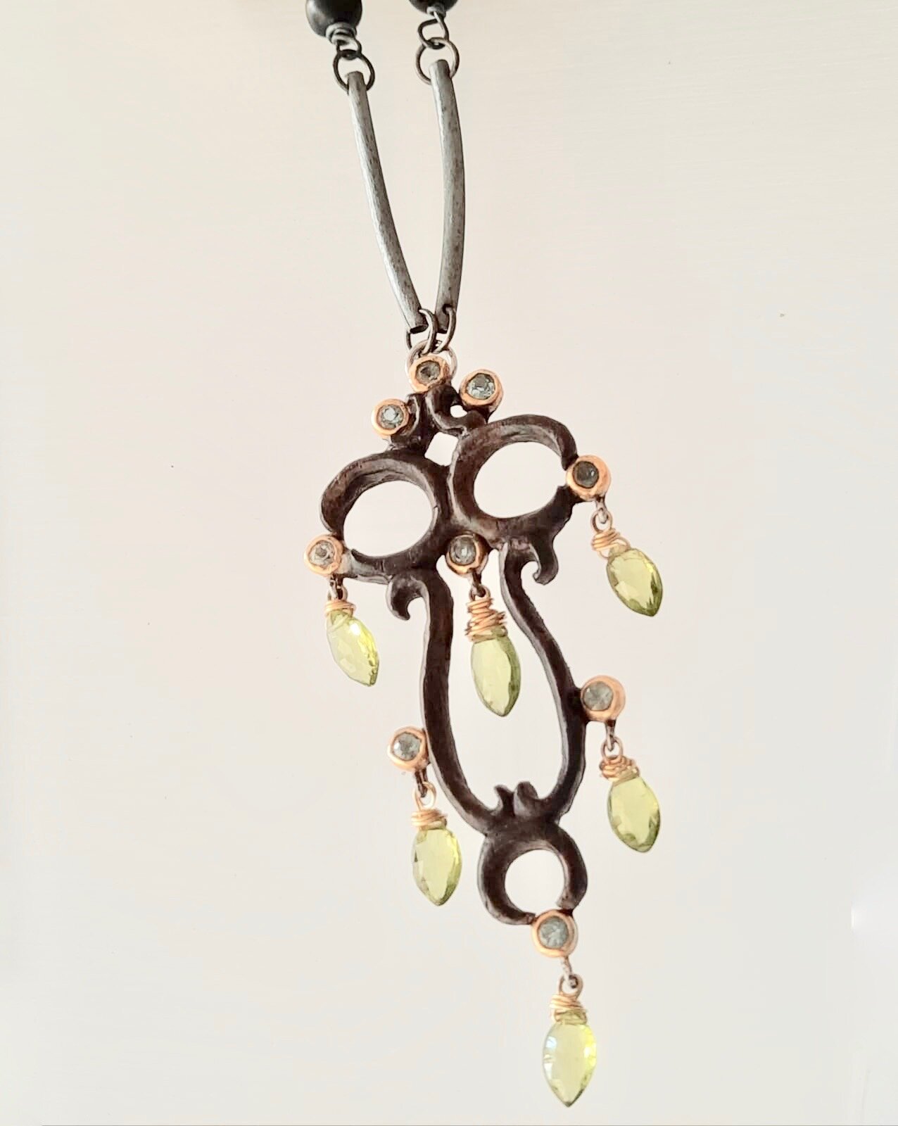 Ebony necklace, 22kt gold and silver with Peridot and Aquamarine
