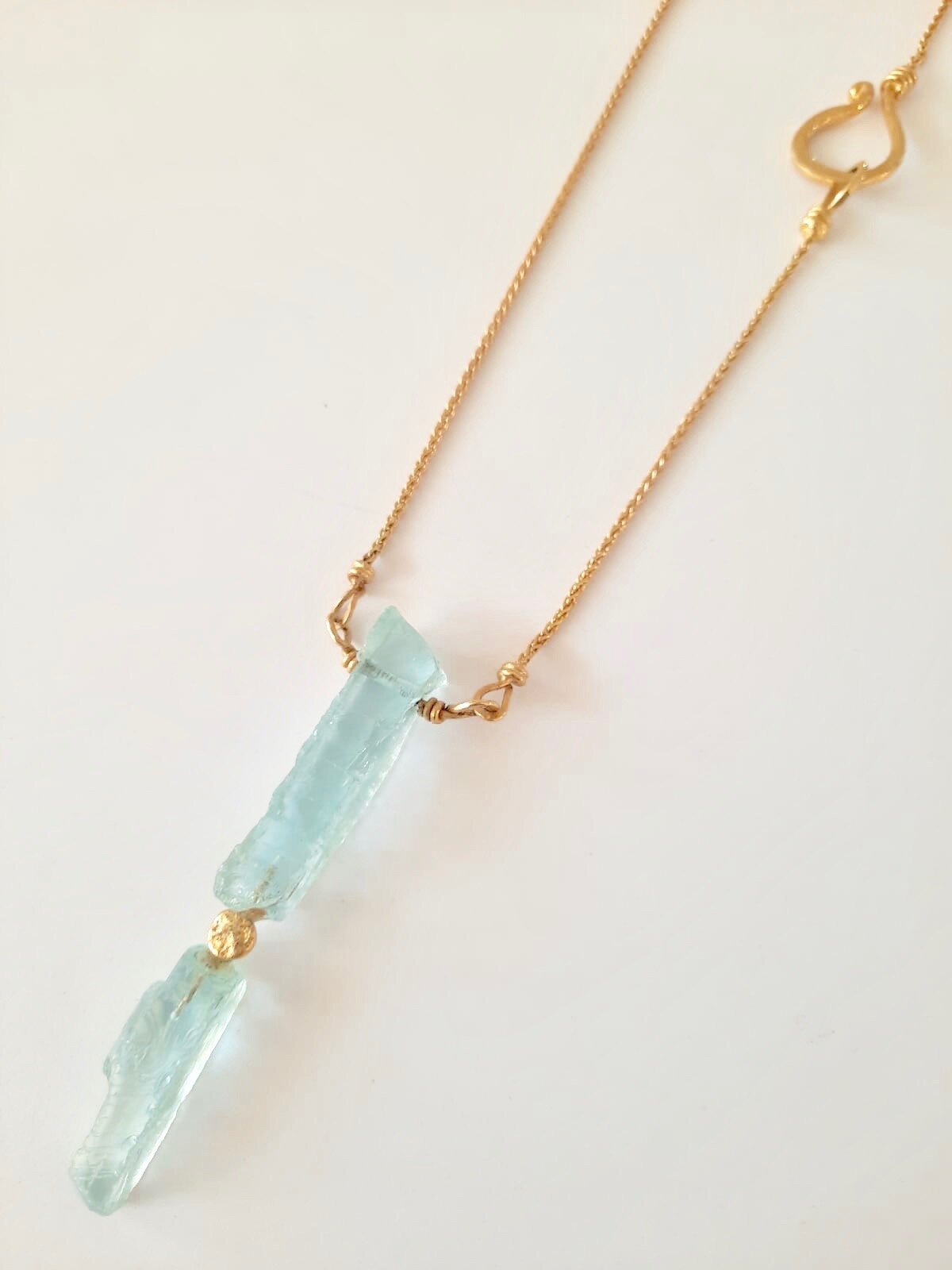 Raw Aqua Marine necklace with 18kt gold