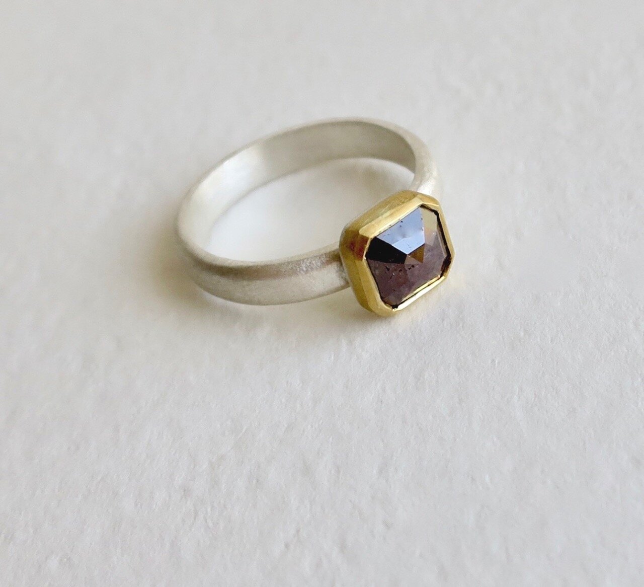 Rose cut brown diamond set in 22kt gold / pure silver band