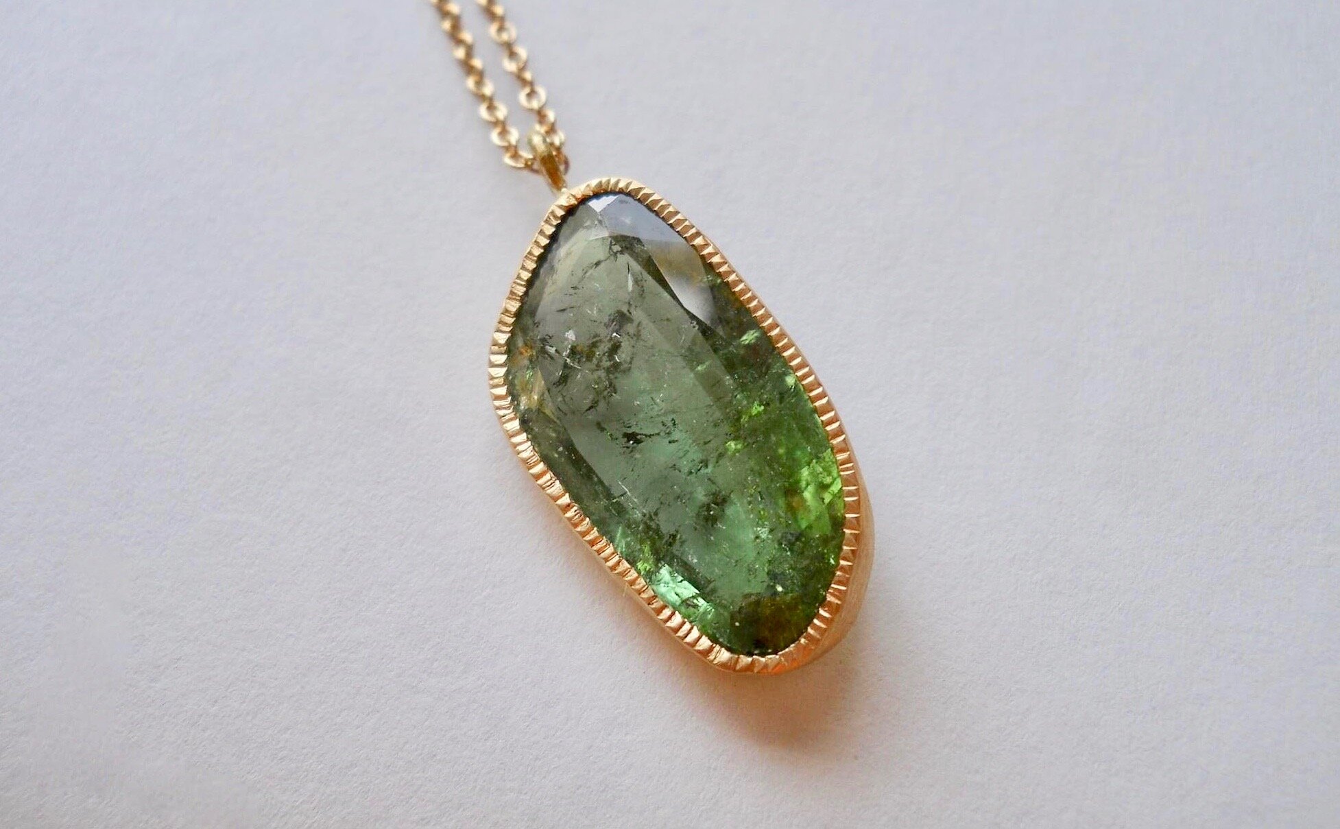 Green Tourmaline pendant set in 22 carat gold