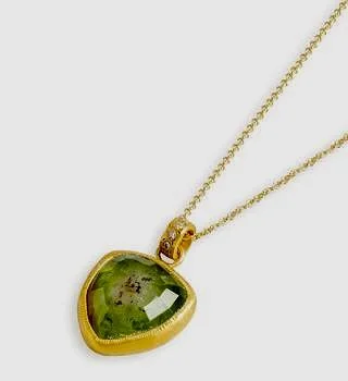 Green Tourmaline pendant, set in 22 carat gold with natural diamond bail