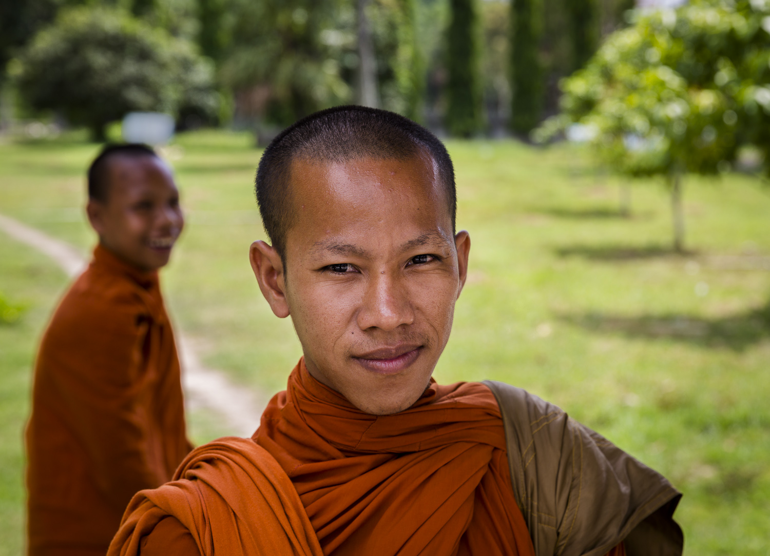 Serious and not so serious monks. Somewhere near Chau Doc. Vietnam.