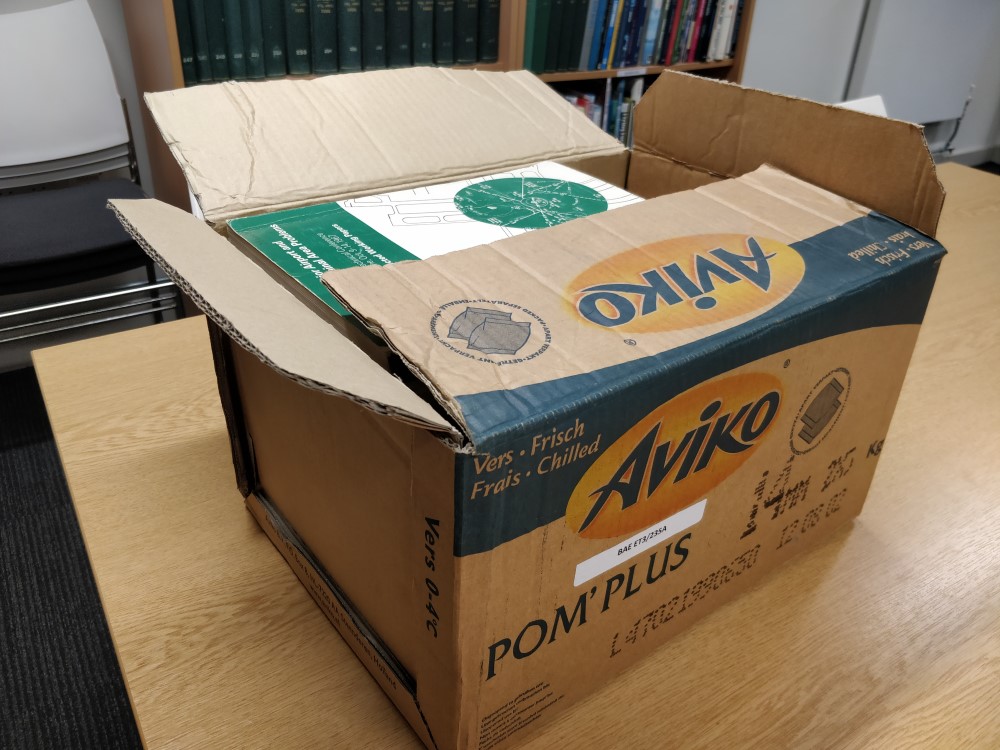 An old cardboard box isn’t the ideal condition for archive documents