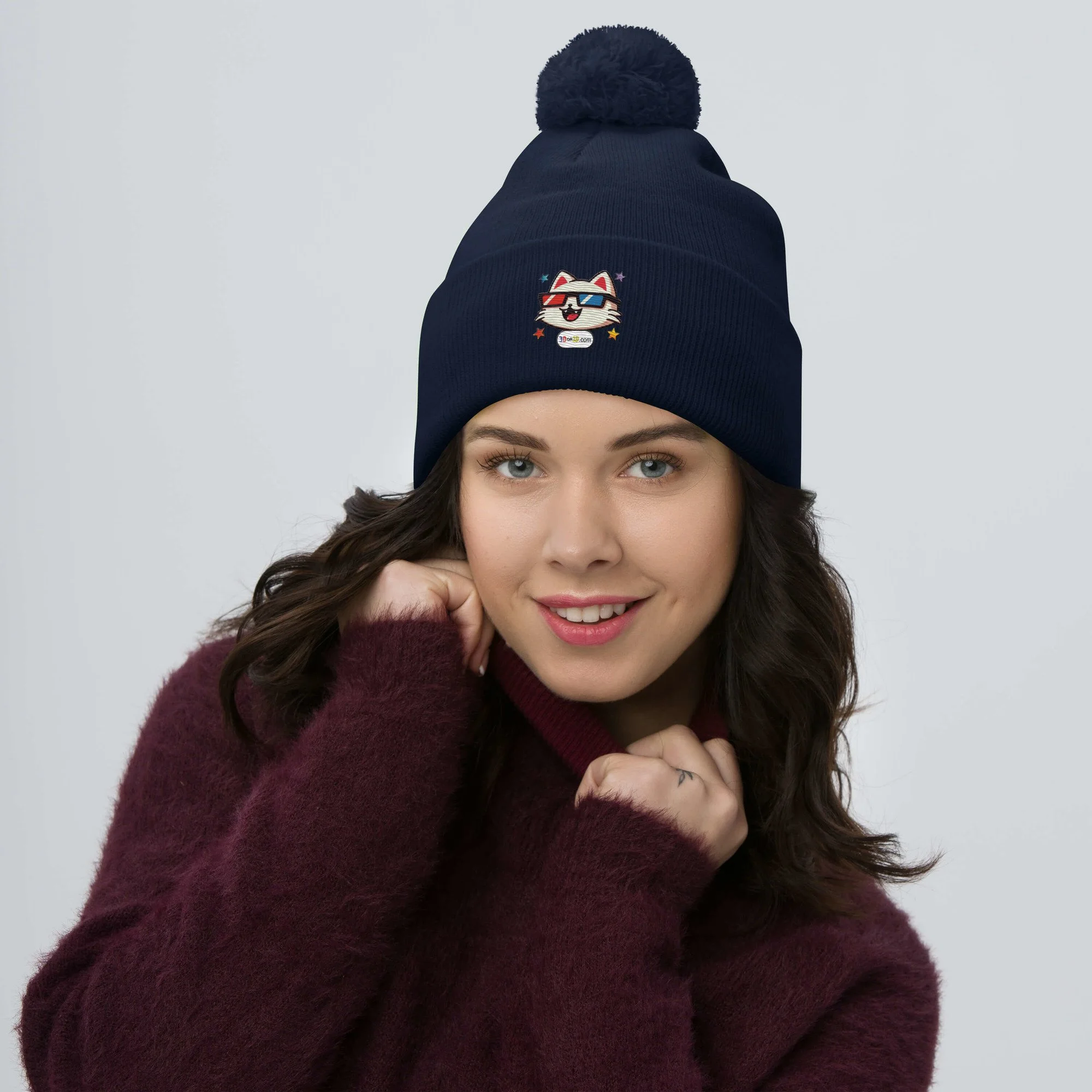 pom-pom-knit-cap-navy-front-6920a48b70290.jpg