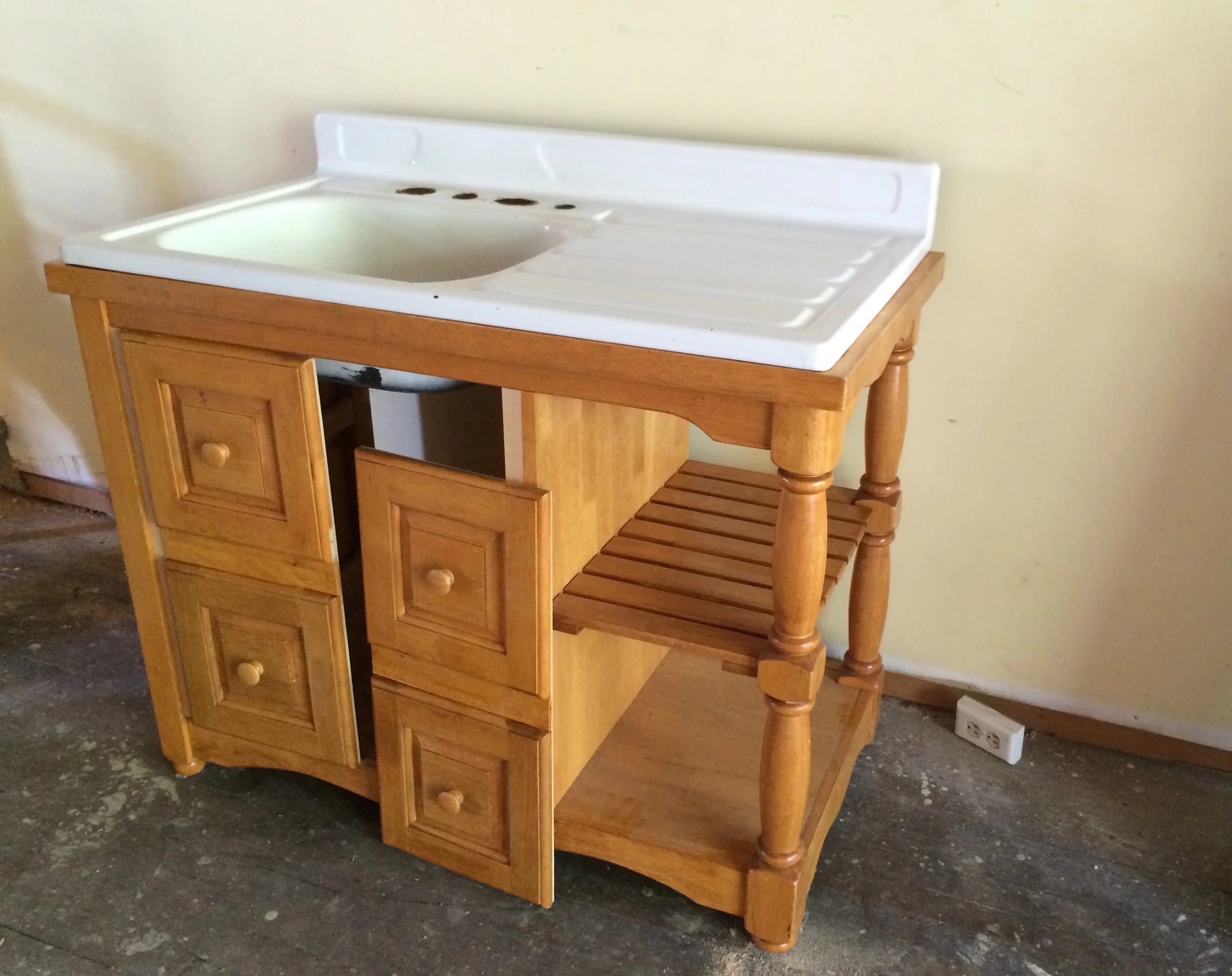 Little weird drawers became little great doors. AND we saved the hole we cut for the sink for a solid maple cutting board. 