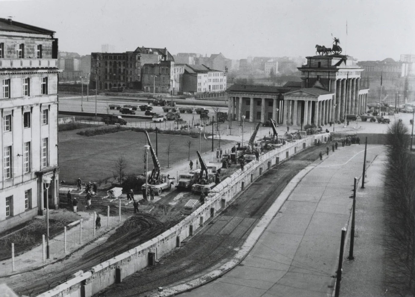 East German Workers reinforce the Berlin Wall near the Brandenburg Gate, 1961 (Wikimedia Commons/U.S. Information Service)