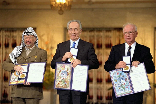 The Nobel Peace Prize laureates for 1994 in Oslo. Image Source: Flickr/ Saar Yaacov, GPO