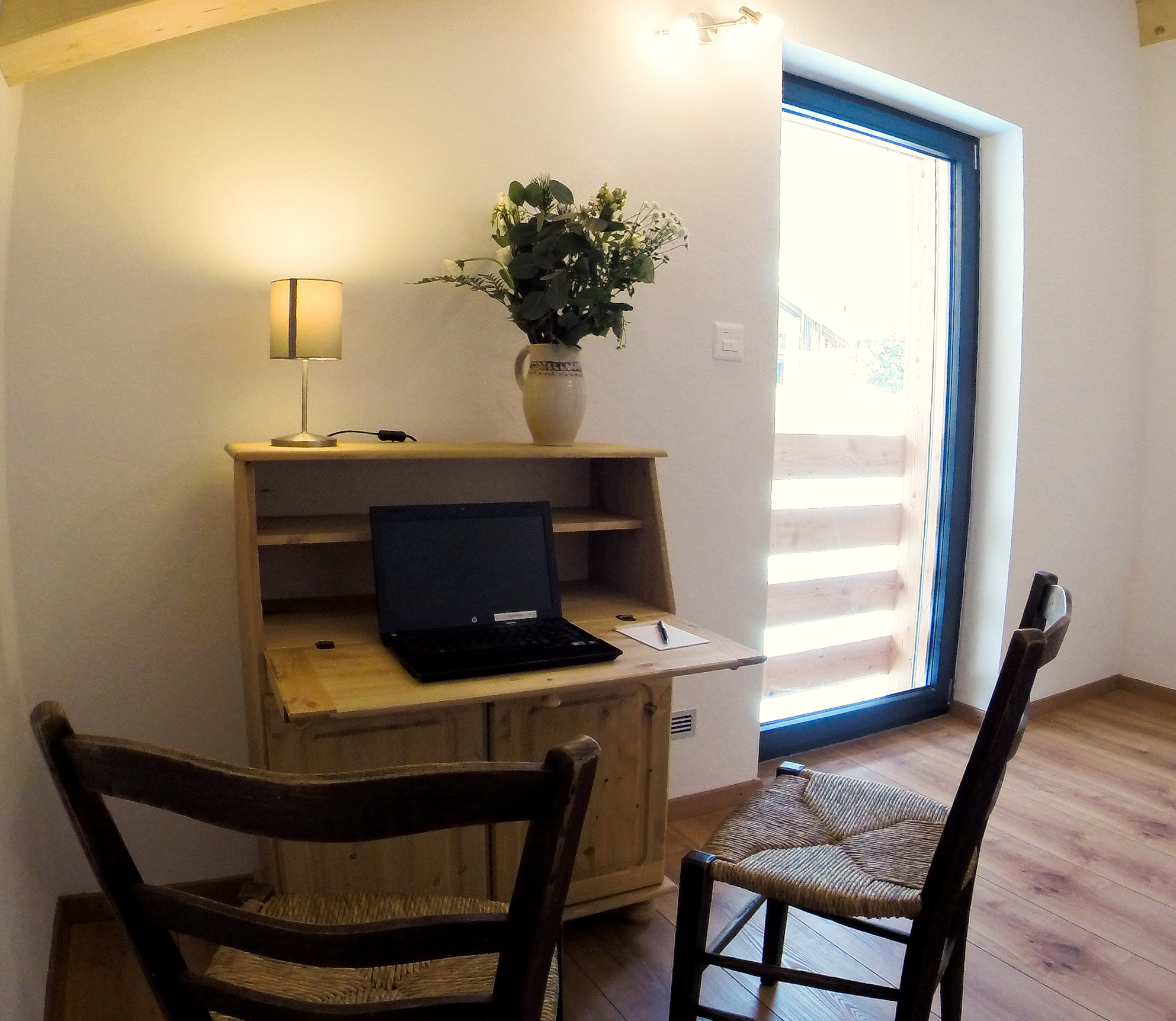 Room B: Twin beds and writing desk
