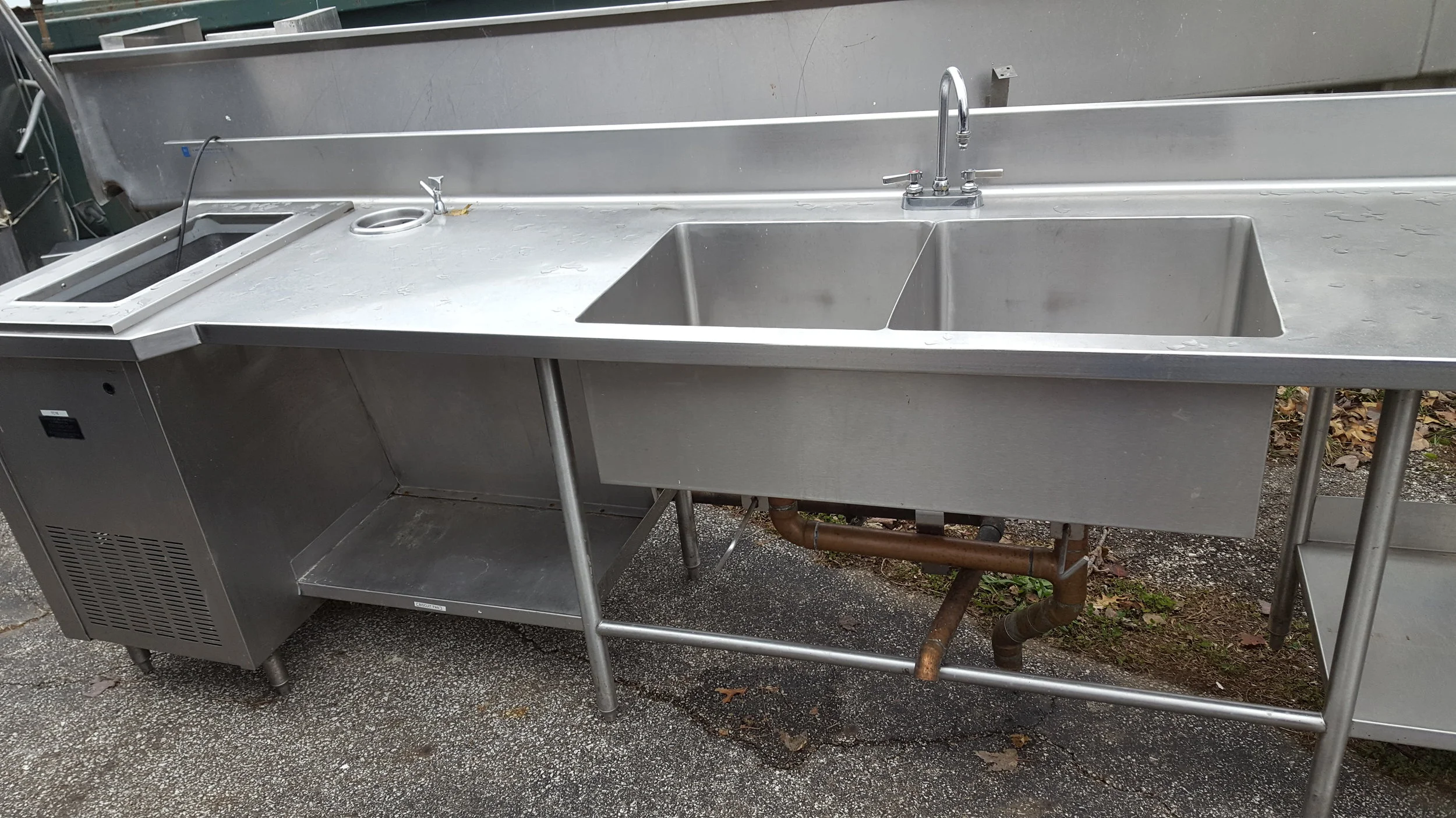 This sink/counter is just one piece of the equipment bought at auction