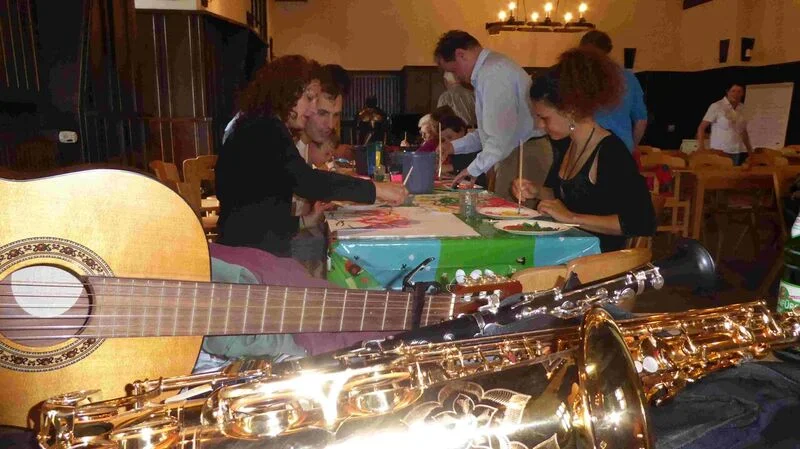 Even as people tested their painting skills, music was always ready to break out.