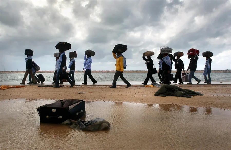 People from many countries flee for their lives. These Africans, having made it as far as Libya, still desperately seek security and a hopeful future.