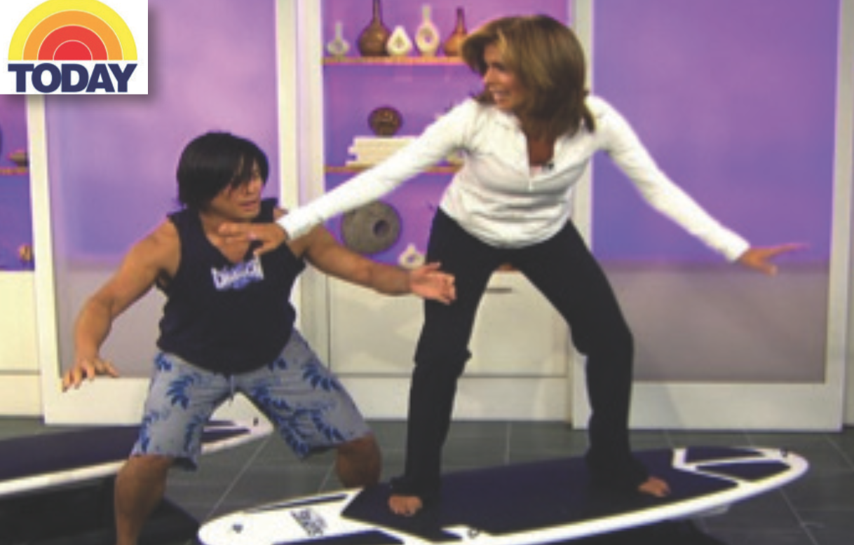 On the Today Show teaching Hoda Kotb a class surfing inspired workout.