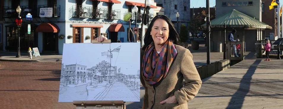 I am pictured here with the drawing which was featured on the Star News Media Commemorative Cup for 2013. It is titled "The Foot of Market Street."
