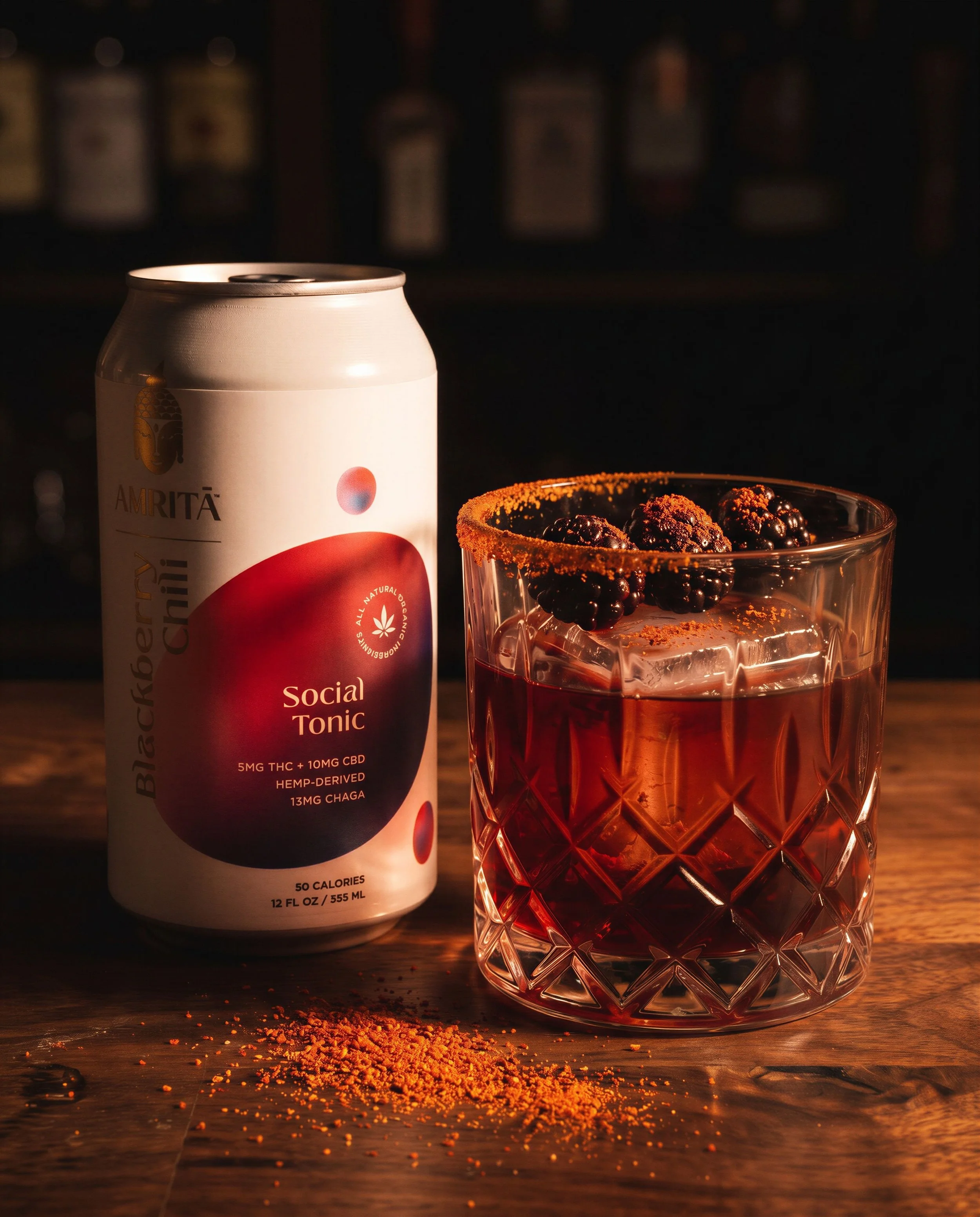 social_tonic_can_beside_amber_drink_glass.jpeg