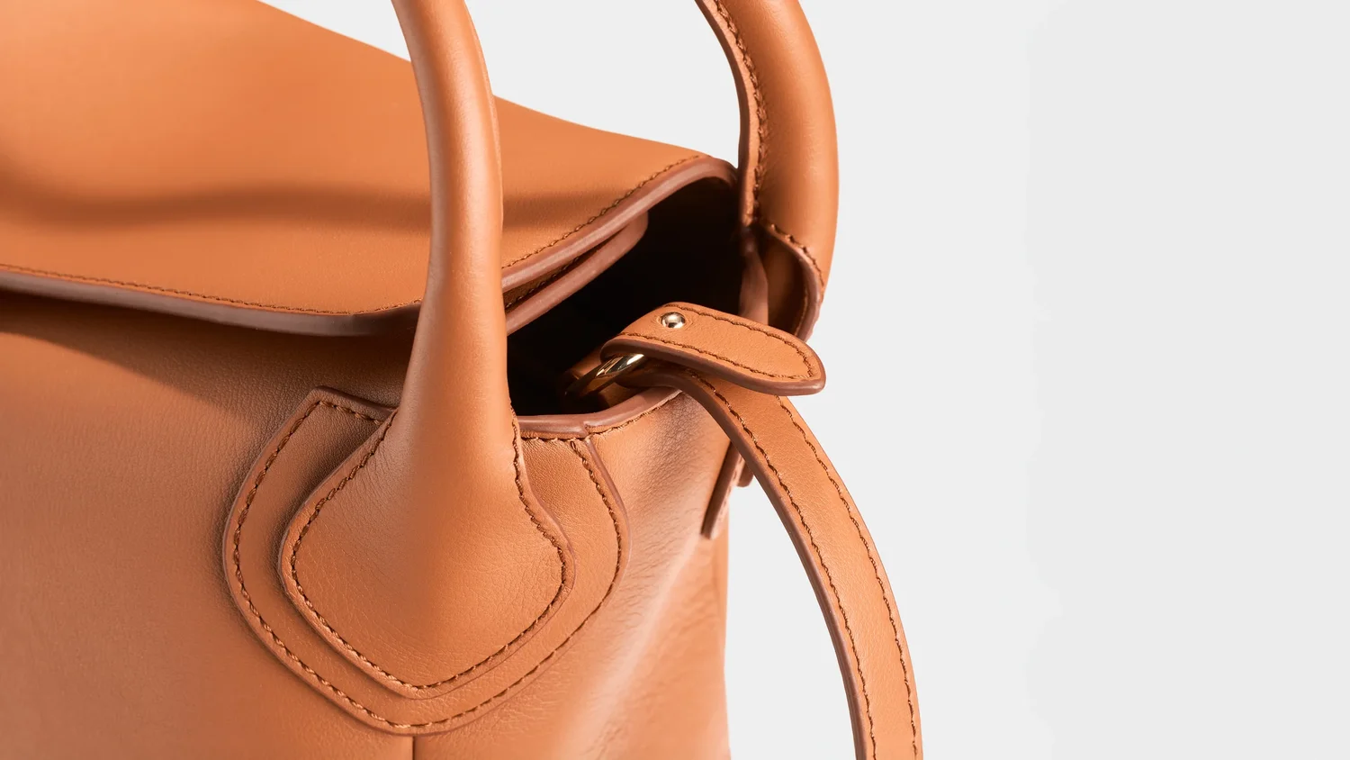 Luxury handbag product photography for Wolves Call on a clean background