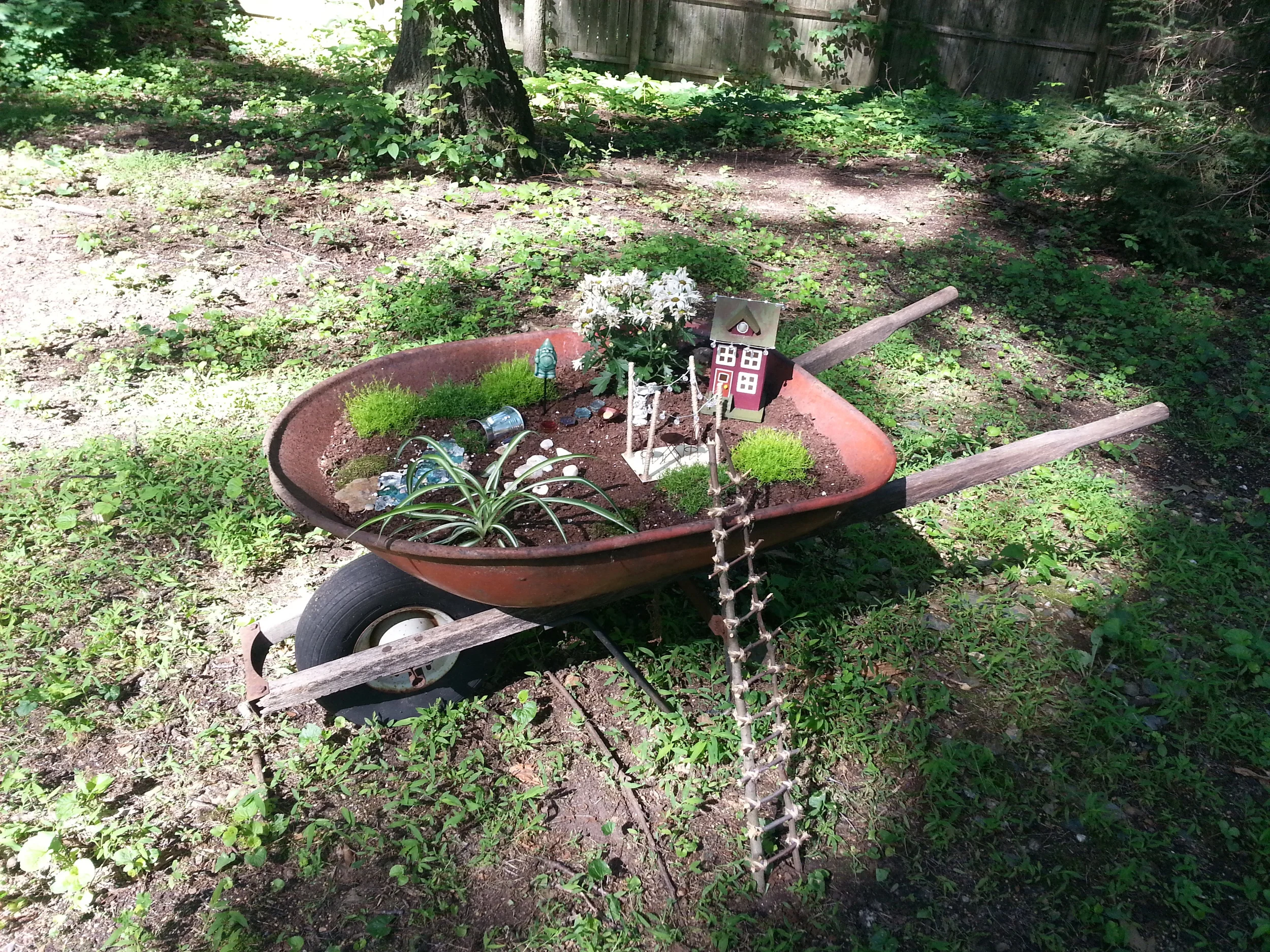 wheelbarrow fairy garden
