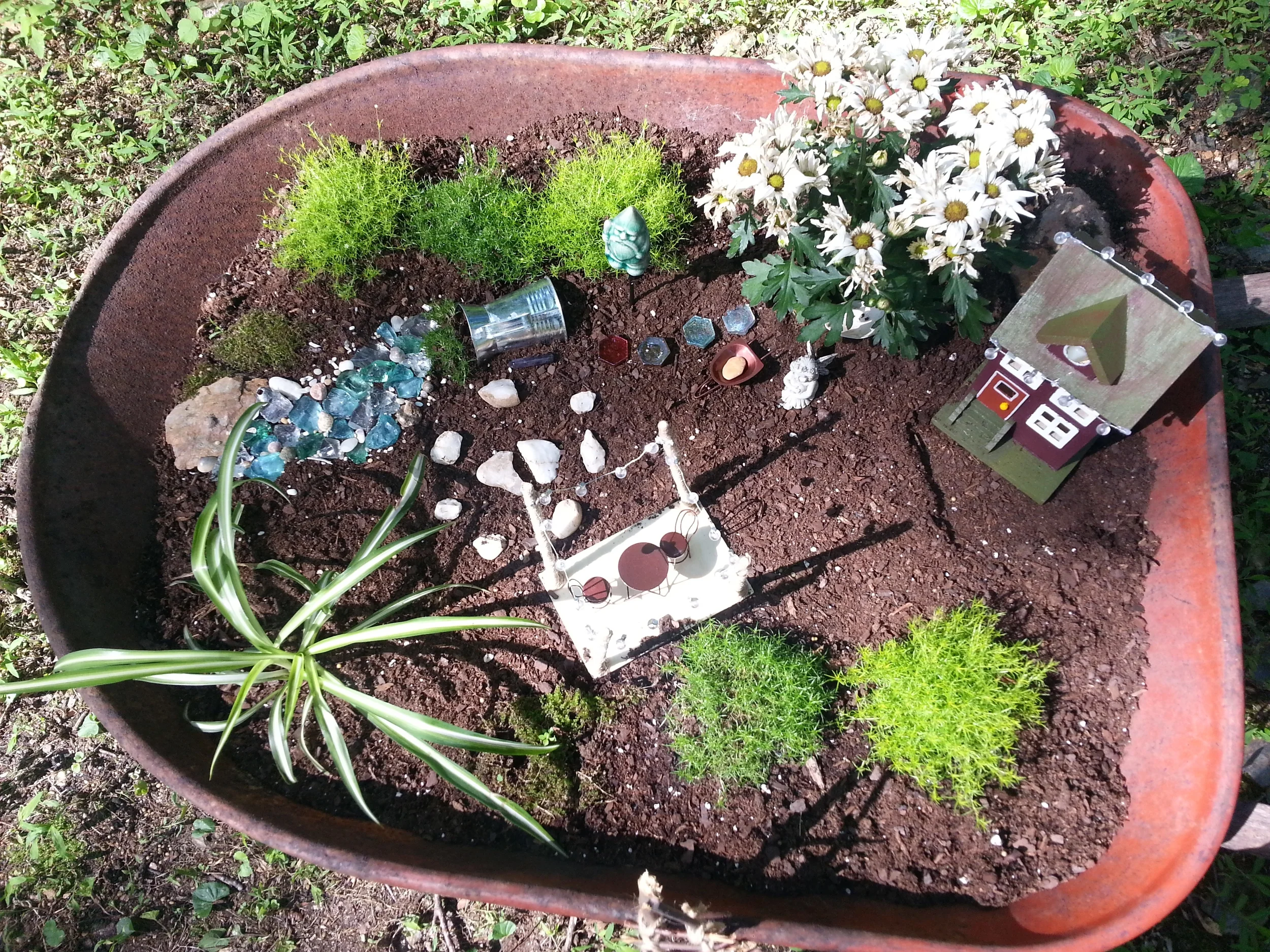 wheelbarrow fairy garden