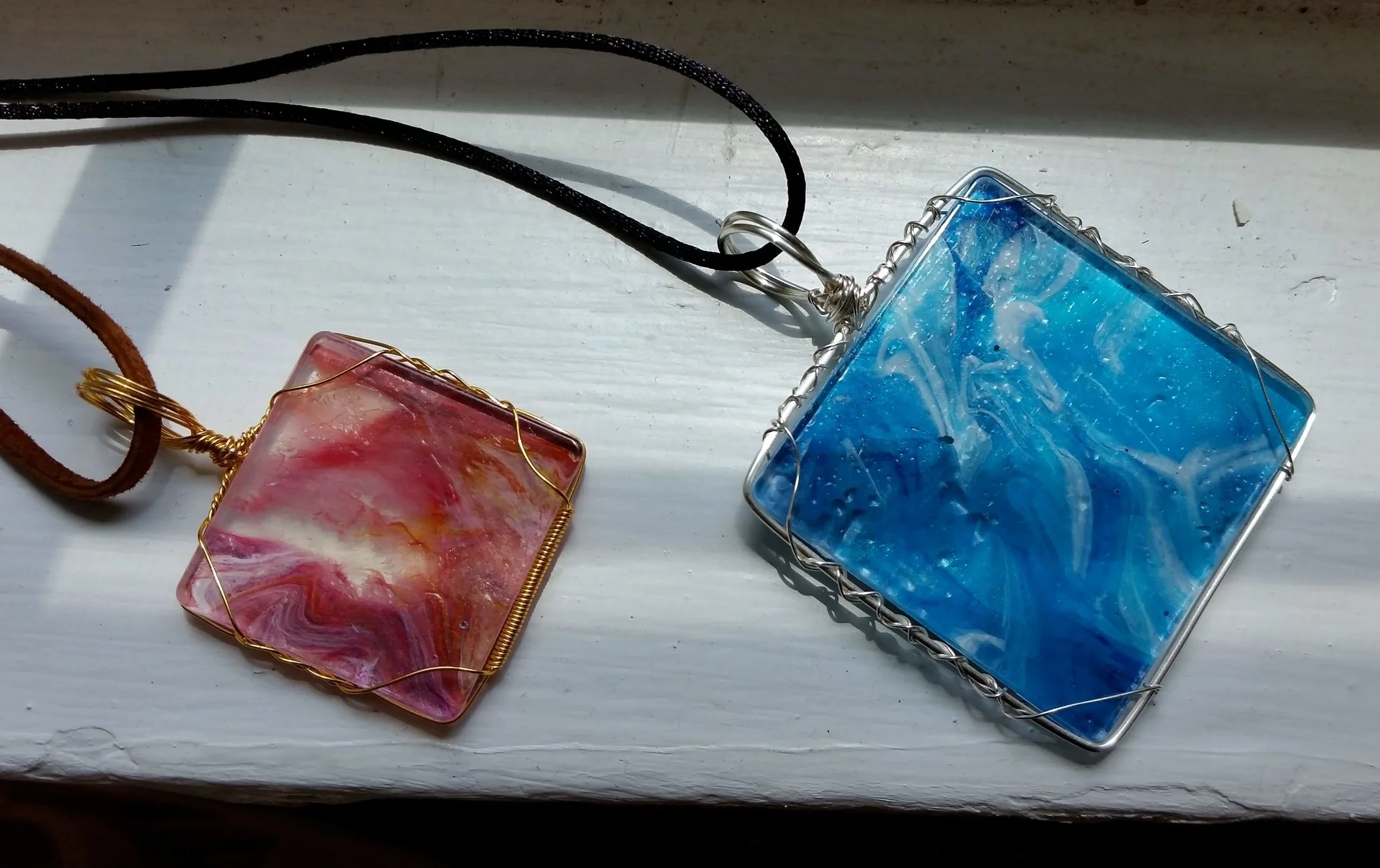 Paint skin pendants, side one, 2018